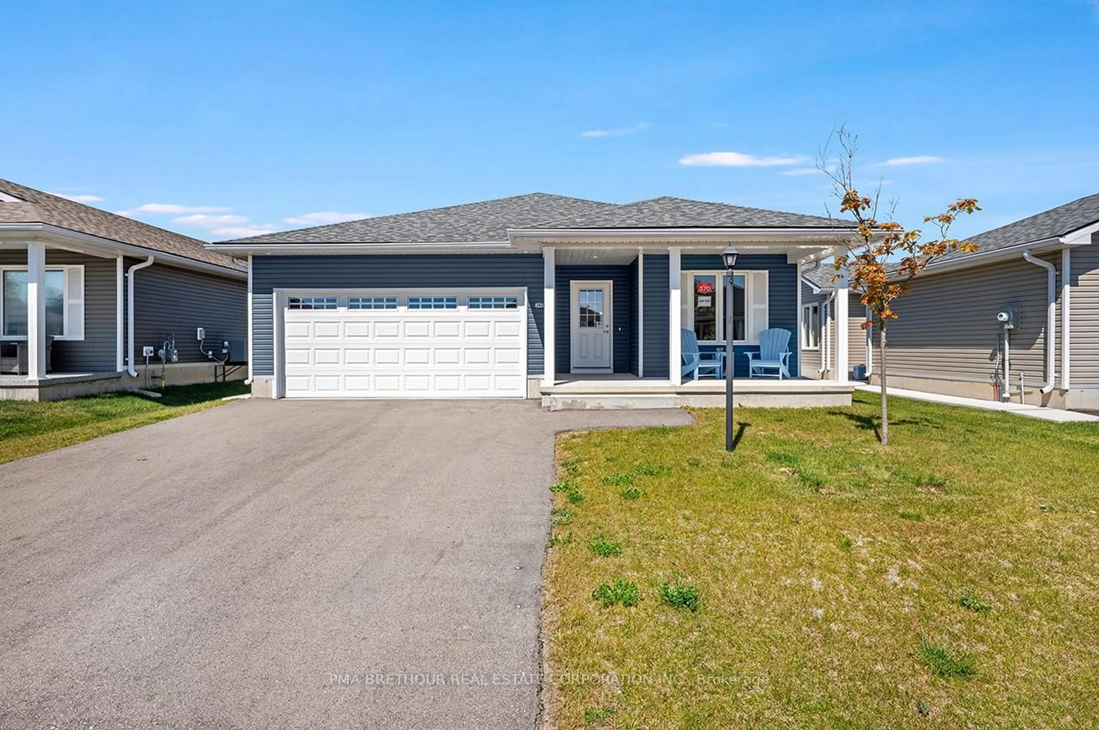 Home with vinyl exterior material, street for 242 Lake Breeze Dr, Ashfield-Colborne-Wawanosh Ontario N7A 0C6