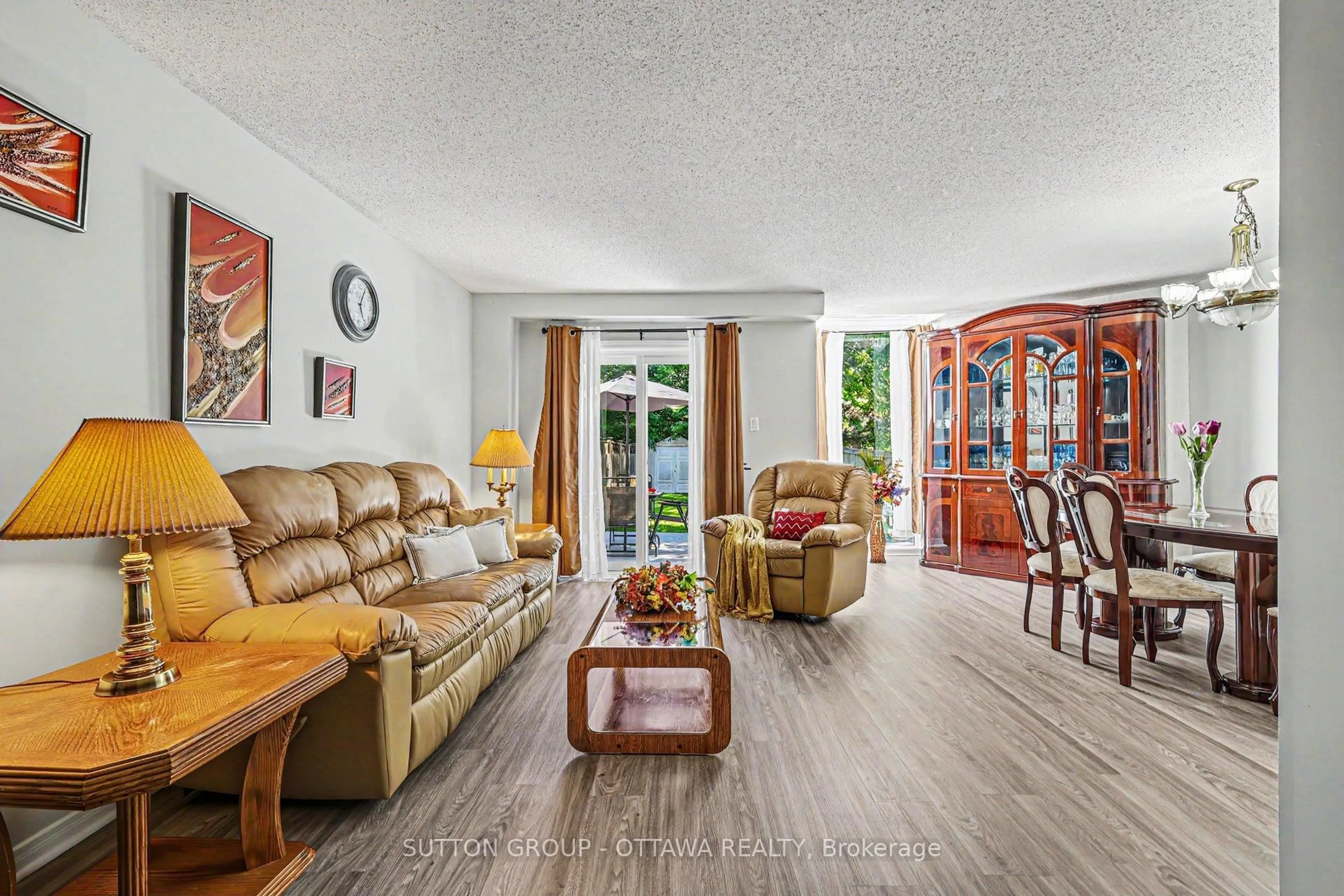Living room with furniture, ceramic/tile floor for 80 Burlington Cres, Ottawa Ontario K1T 3K4