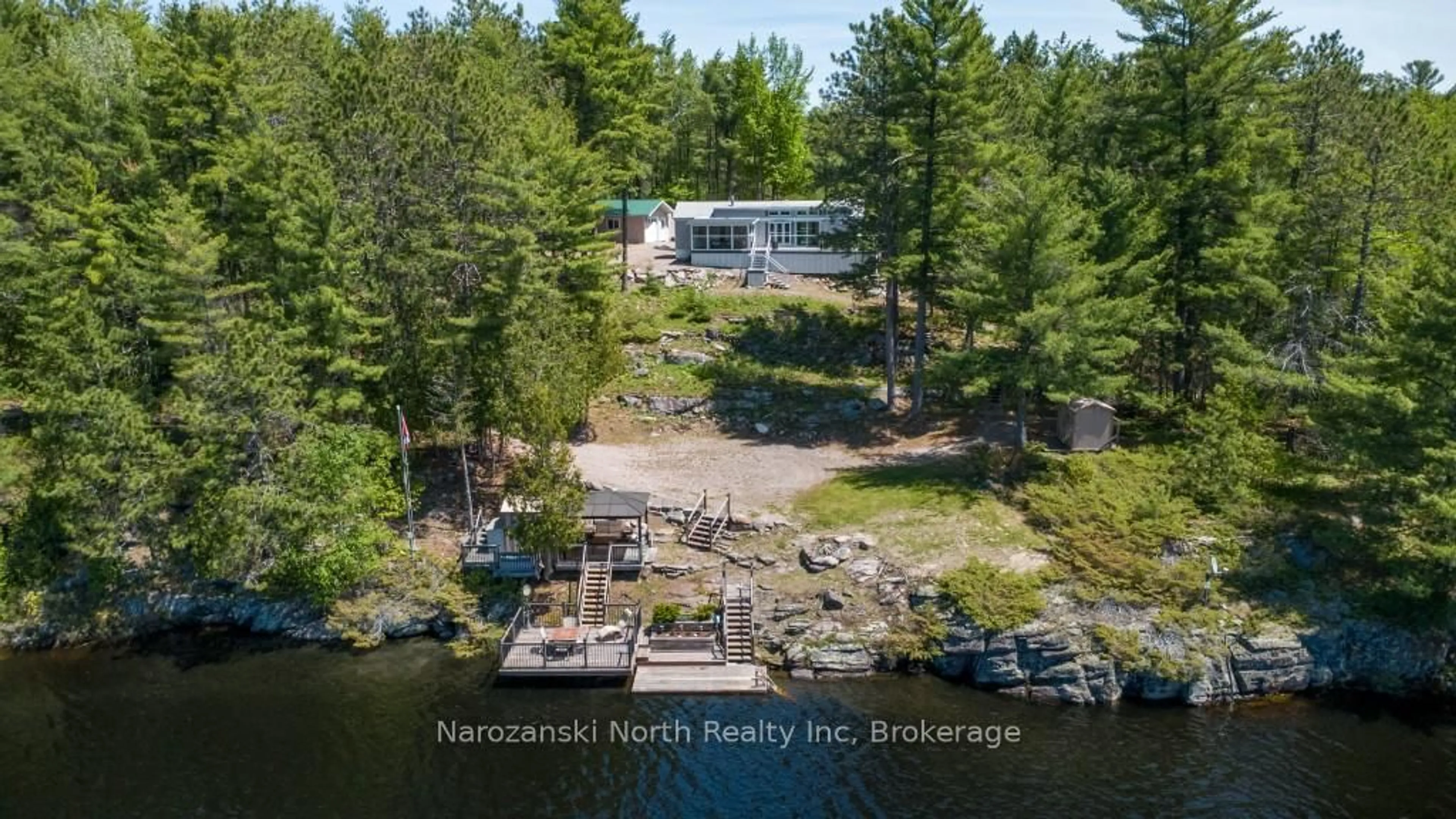 A pic from outside/outdoor area/front of a property/back of a property/a pic from drone, water/lake/river/ocean view for 385 forest hill Rd, French River Ontario P0M 2K0