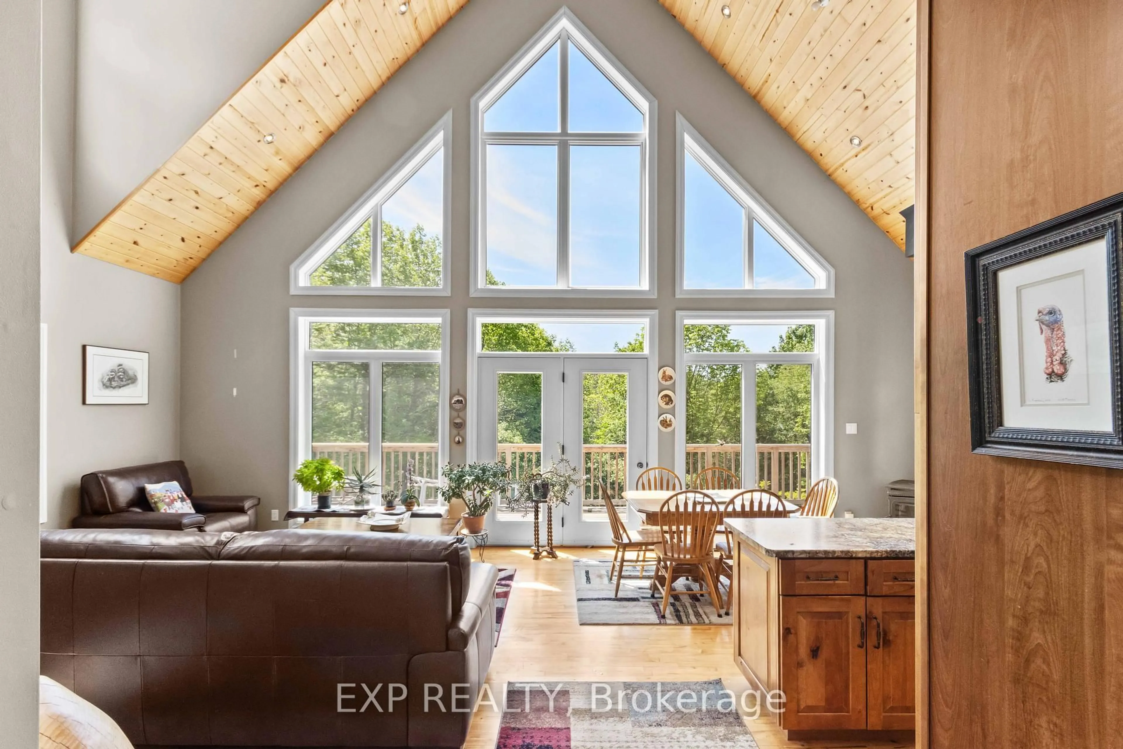 Living room with furniture, wood/laminate floor for 144 Trebinski Rd, Barry's Bay Ontario K0J 1B0