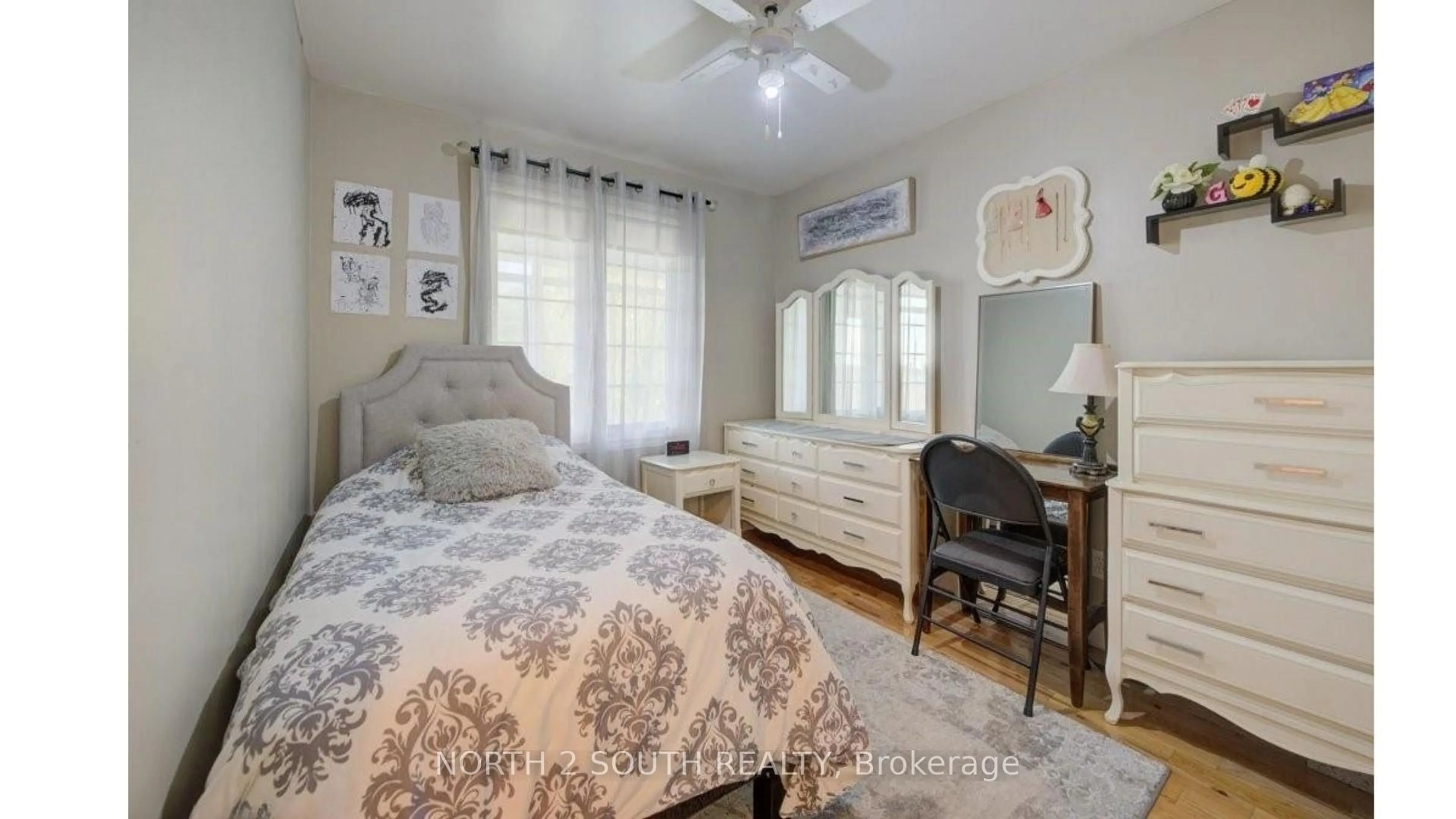 Bedroom with bed, wood/laminate floor for 6737 Highway 20, West Lincoln Ontario L0R 2A0