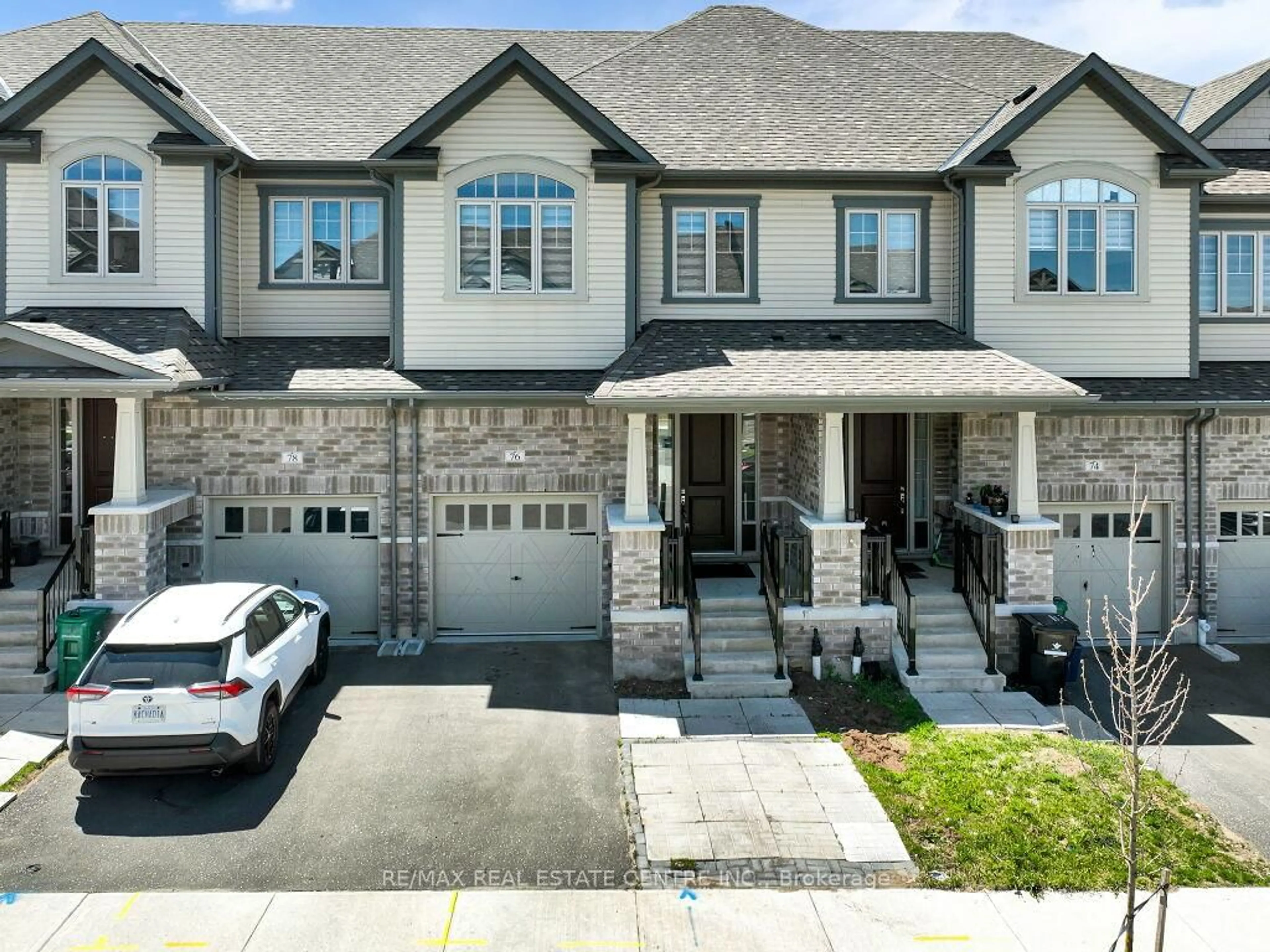 Home with brick exterior material, street for 76 Grassbourne Ave, Kitchener Ontario N2R 0S5