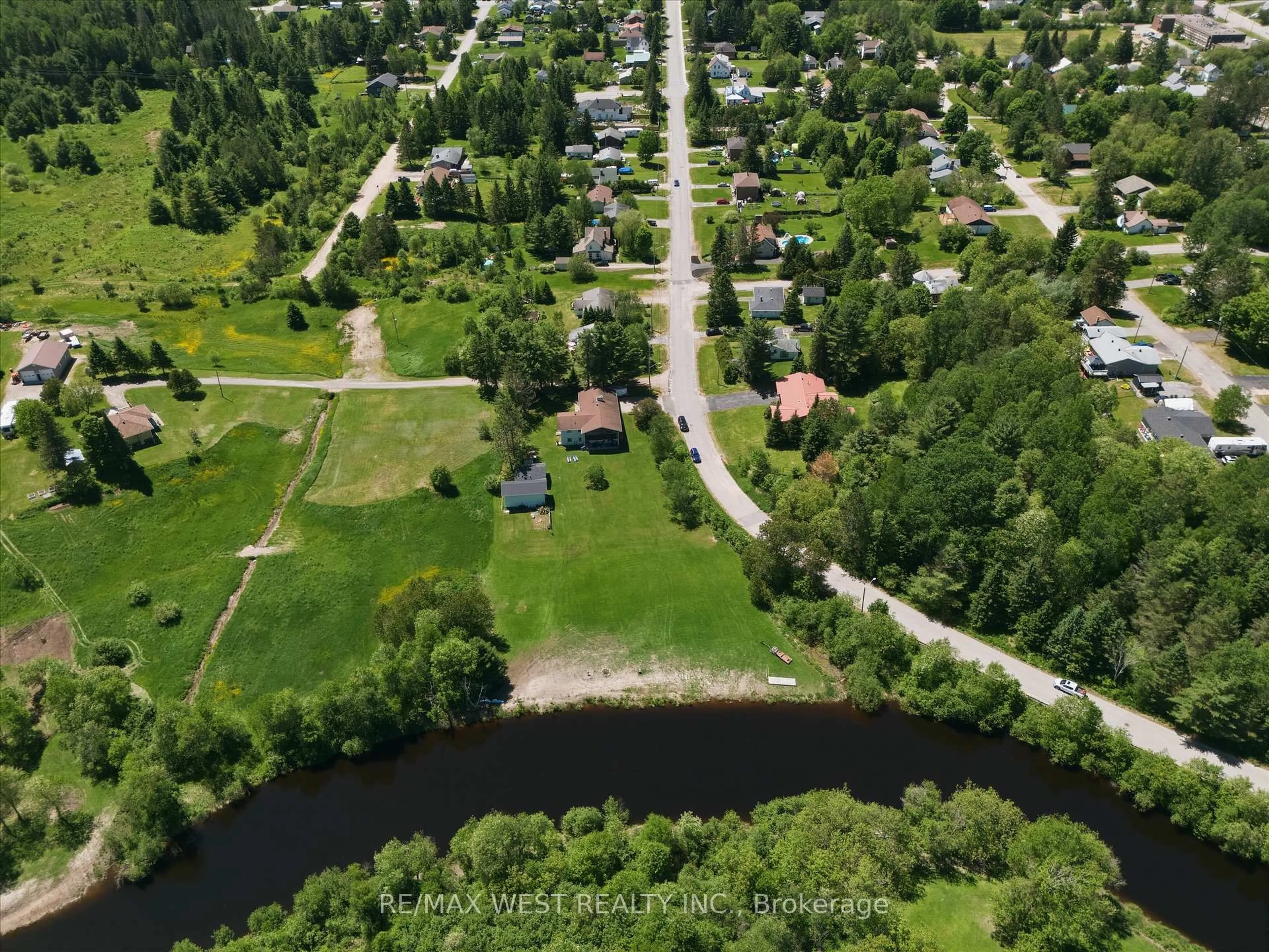 A pic from outside/outdoor area/front of a property/back of a property/a pic from drone, water/lake/river/ocean view for 236 Queen St, Burk's Falls Ontario P0A 1C0