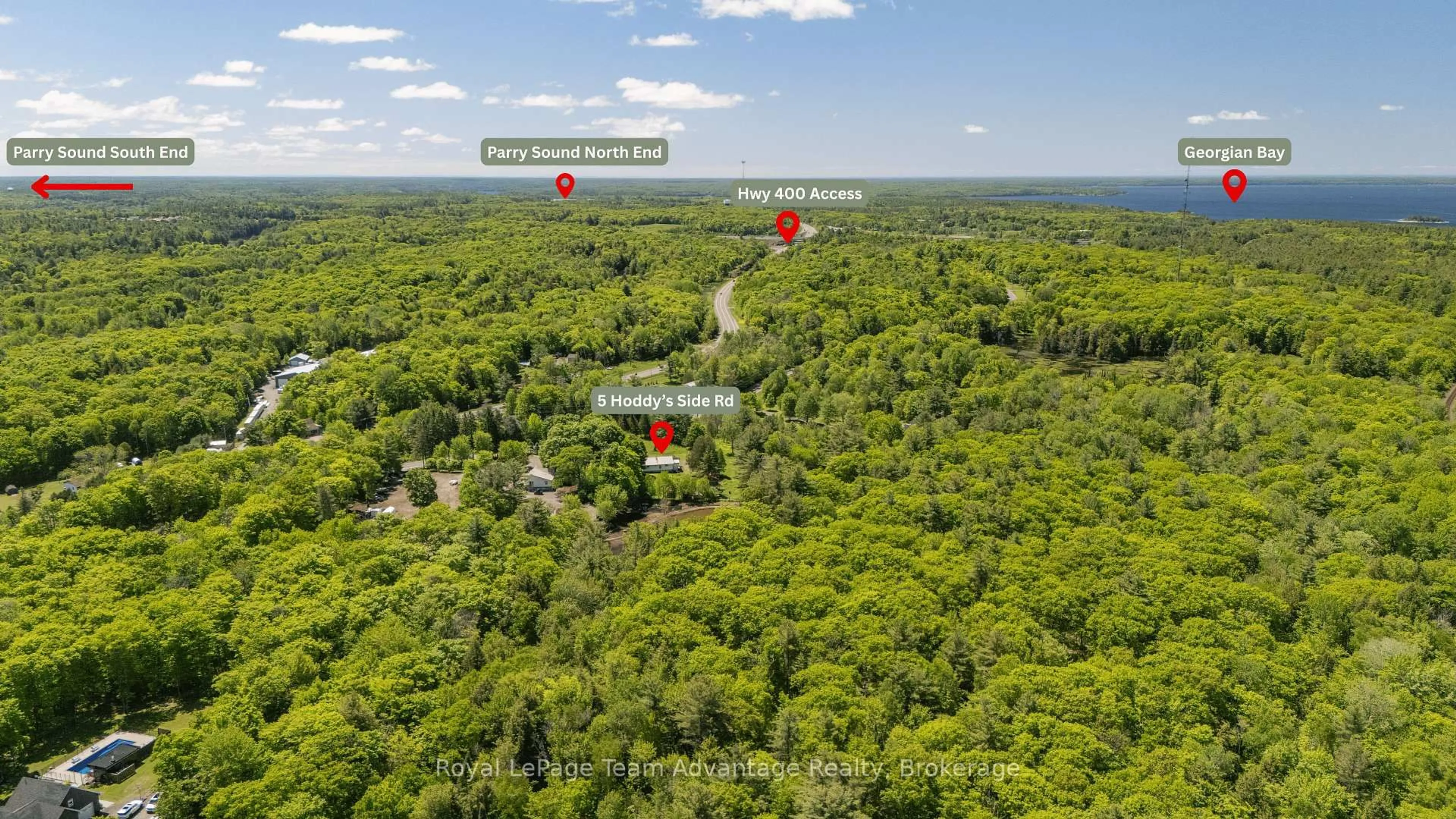 A pic from outside/outdoor area/front of a property/back of a property/a pic from drone, forest/trees view for 5 Hoddy's Side Rd, McDougall Ontario P2A 2W9