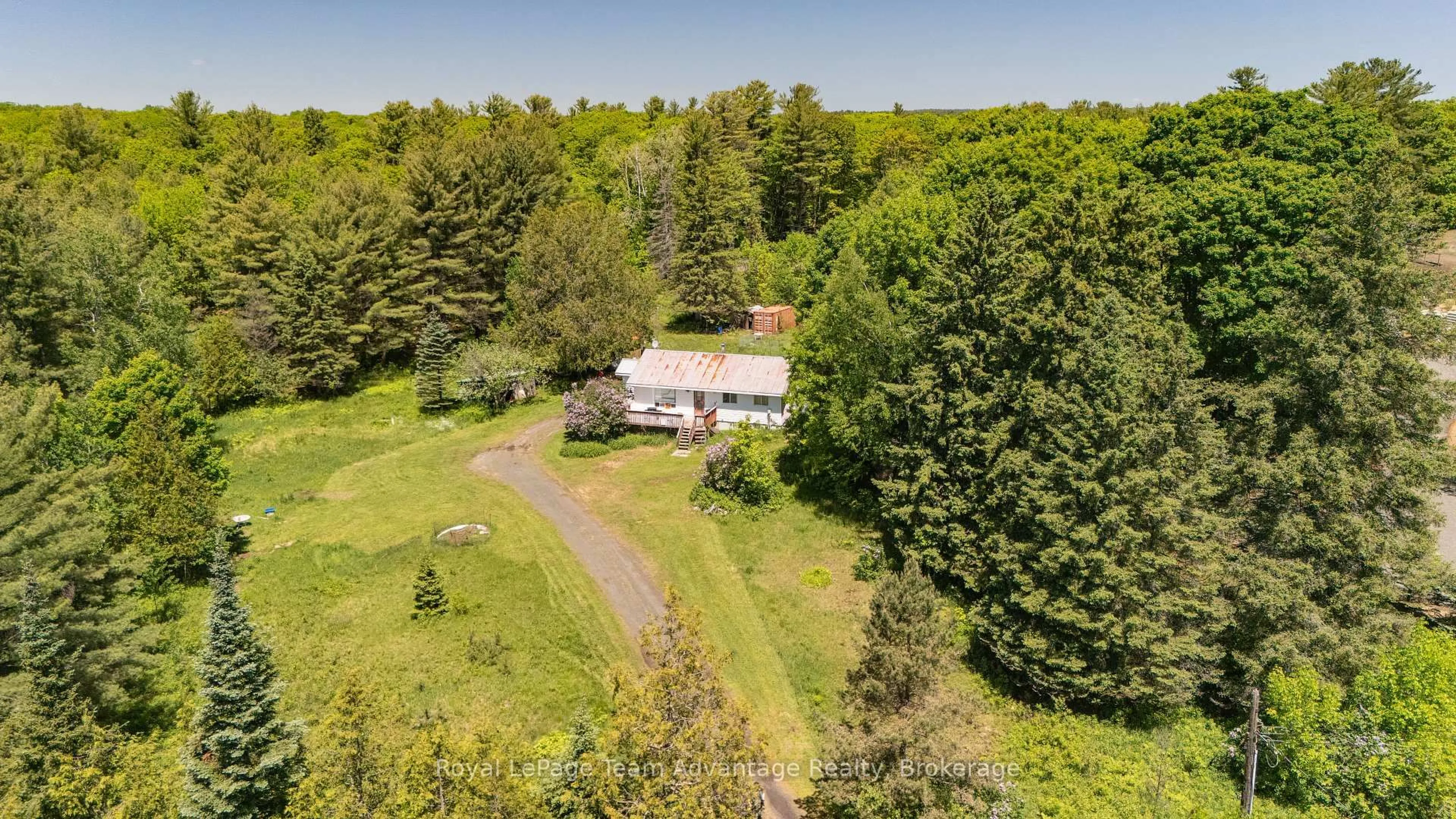 A pic from outside/outdoor area/front of a property/back of a property/a pic from drone, water/lake/river/ocean view for 5 Hoddy's Side Rd, McDougall Ontario P2A 2W9
