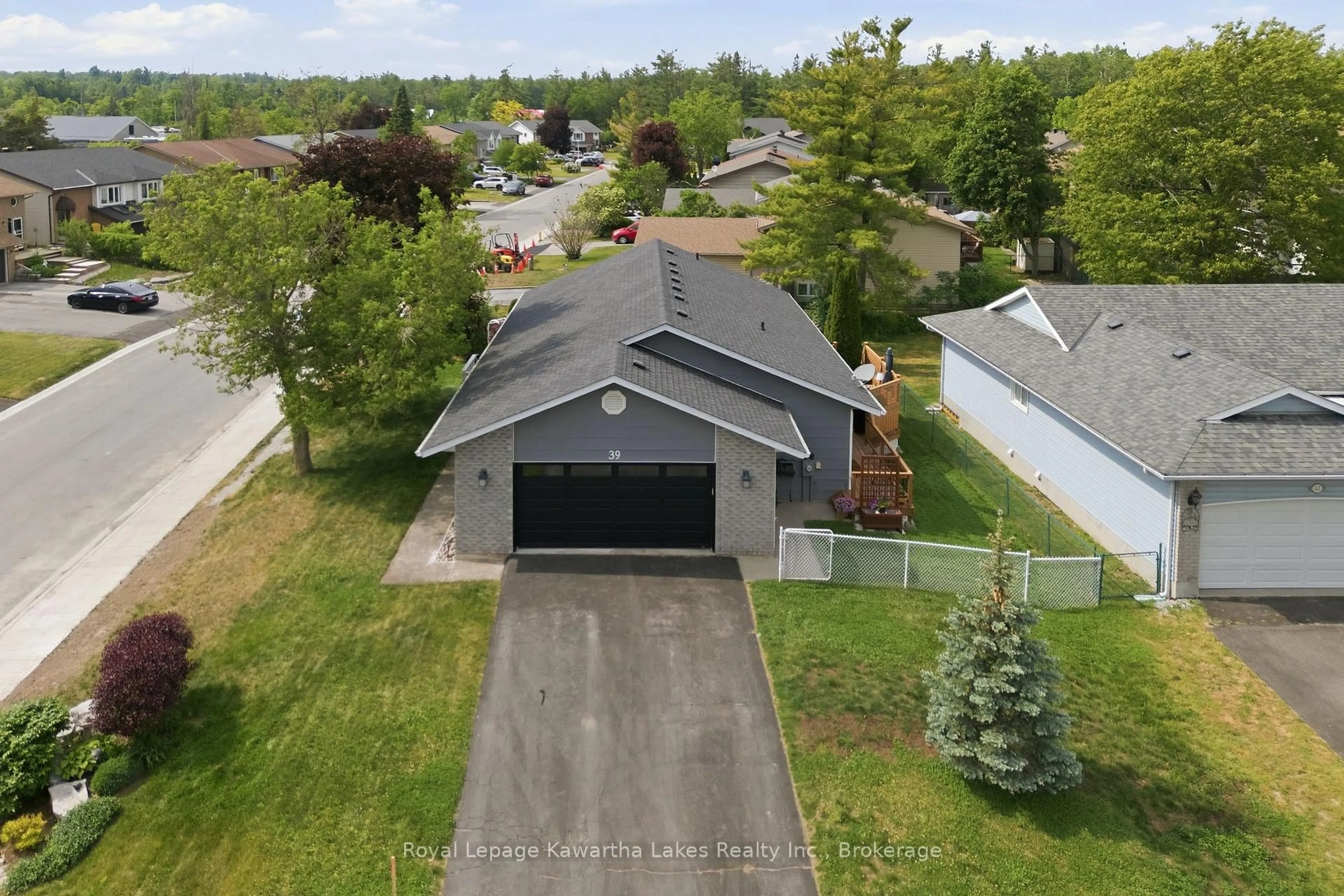 A pic from outside/outdoor area/front of a property/back of a property/a pic from drone, street for 39 Cedartree Lane, Kawartha Lakes Ontario K0M 1A0