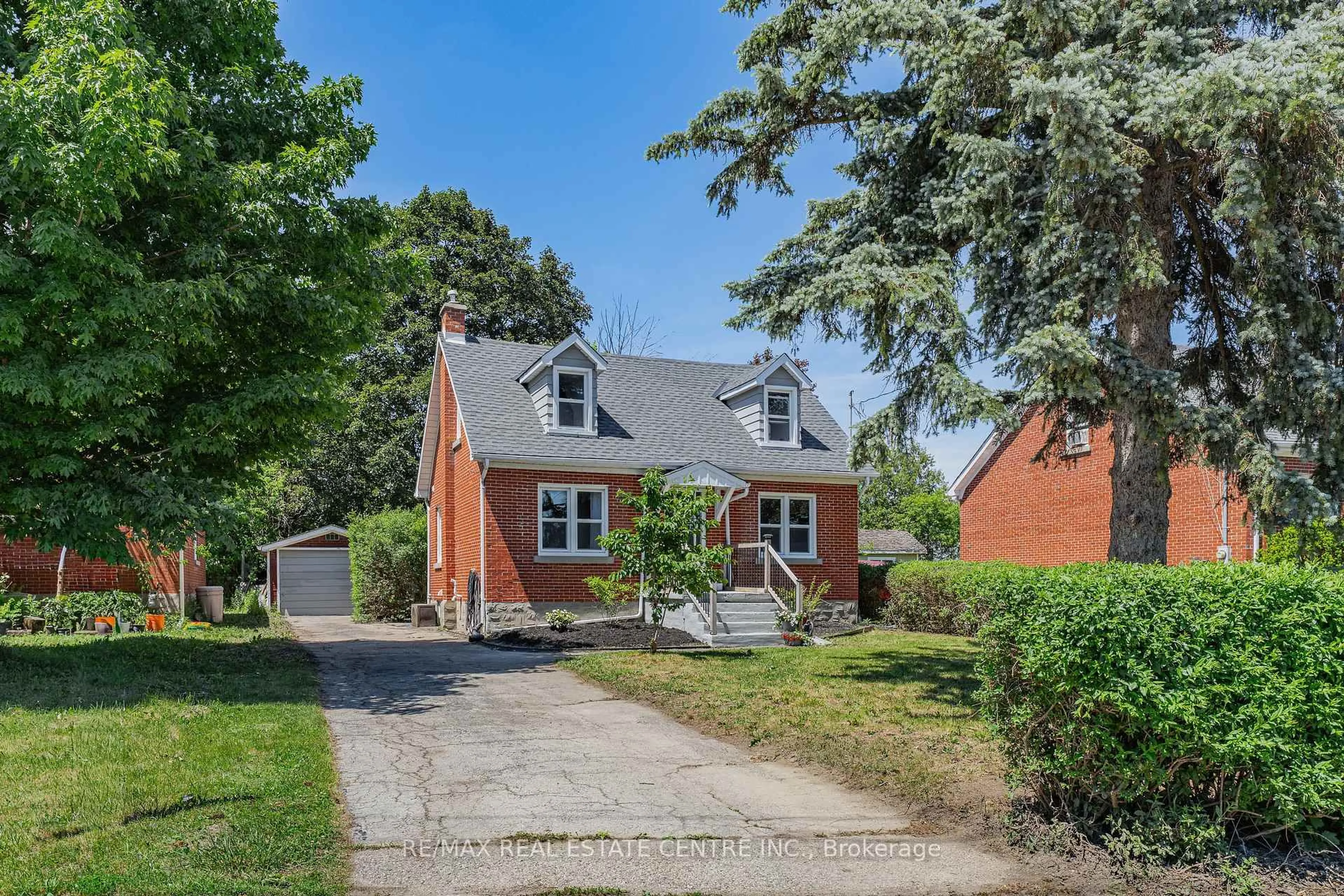 Home with brick exterior material, street for 154 Bridgeport Rd, Waterloo Ontario N2J 2K4