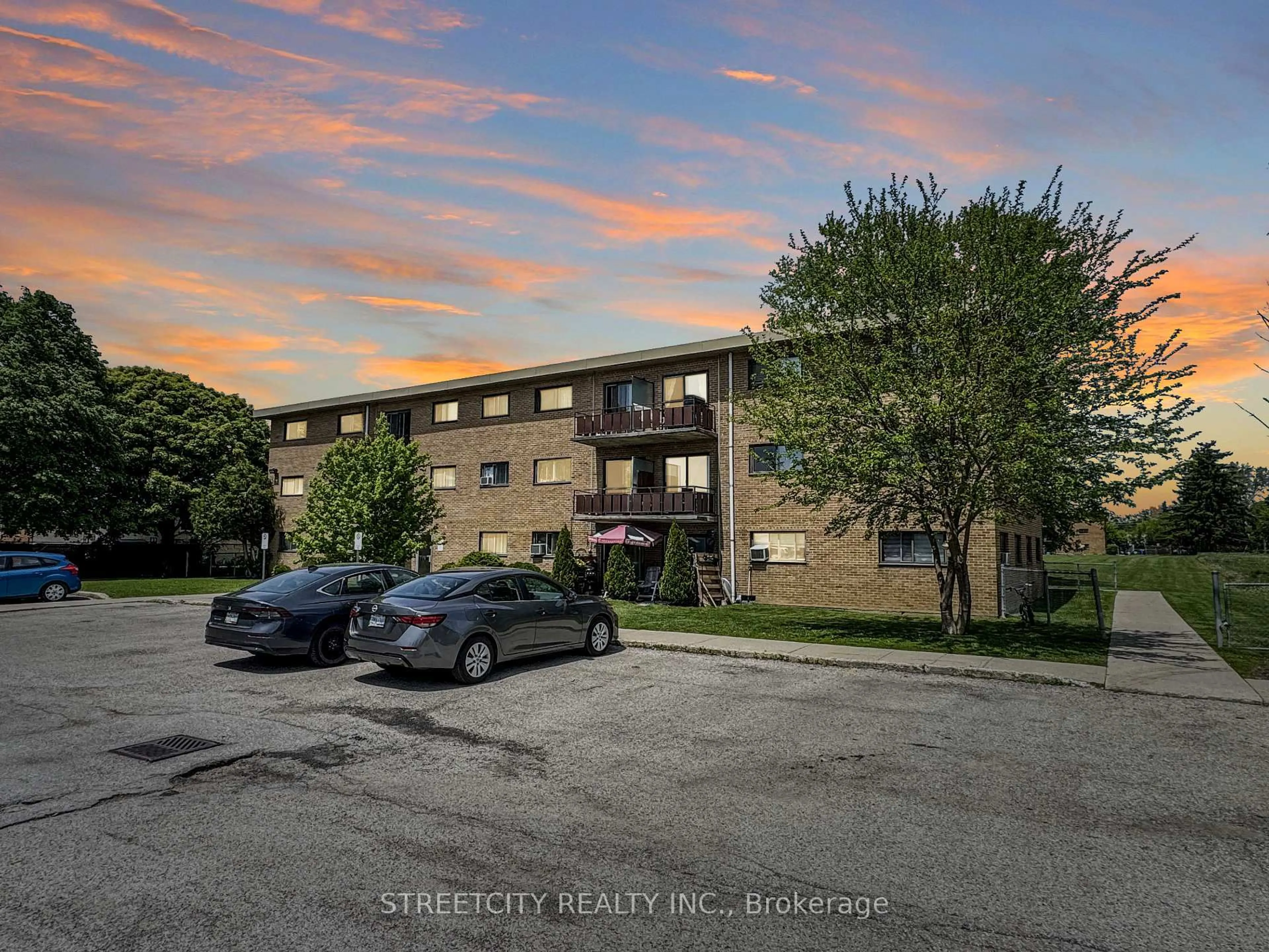 A pic from outside/outdoor area/front of a property/back of a property/a pic from drone, street for 1830 Dumont St #101, London East Ontario N5W 2S1