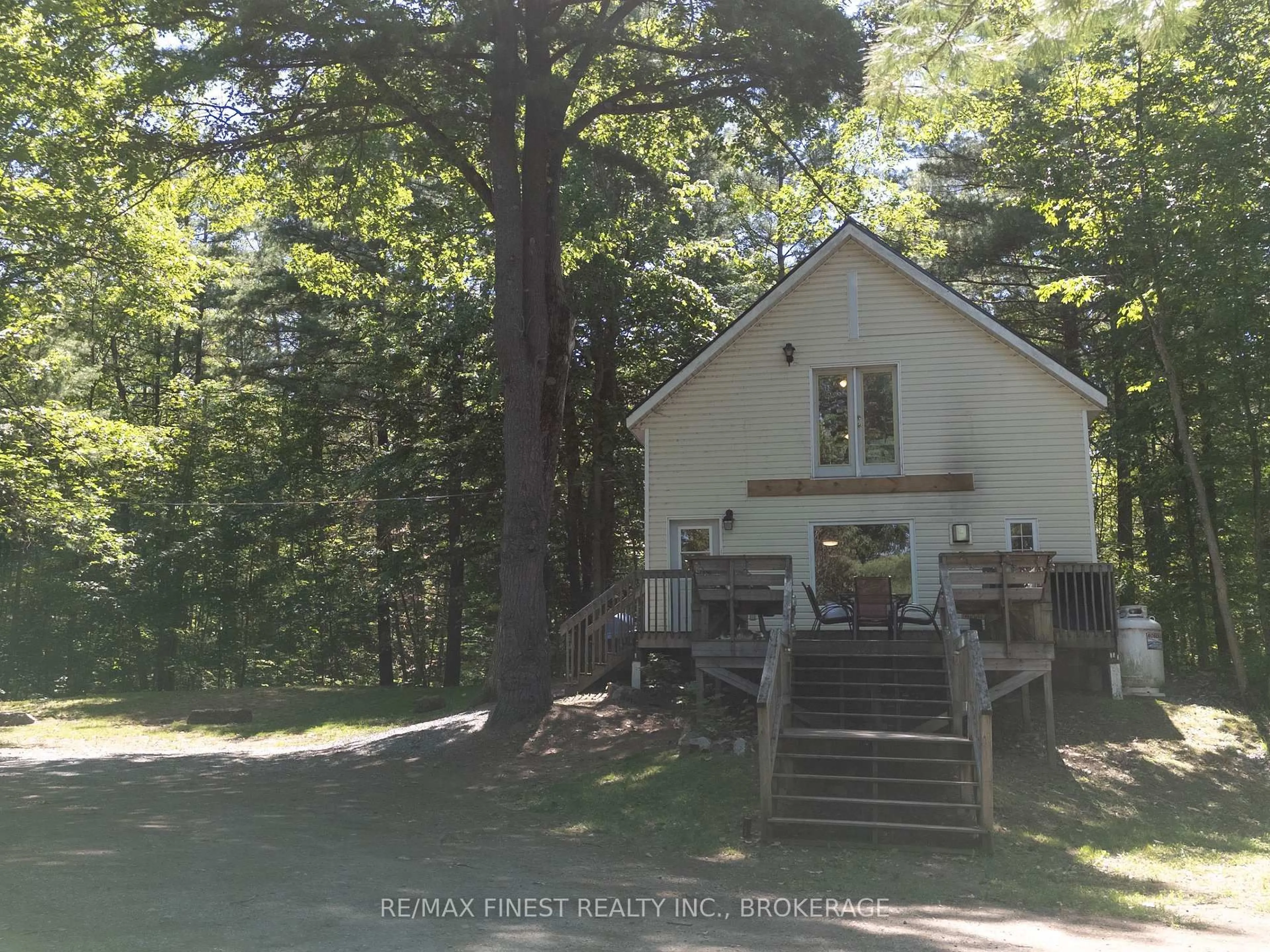 A pic from outside/outdoor area/front of a property/back of a property/a pic from drone, forest/trees view for 1035 Cozy Ridge Lane, Hartington Ontario K0H 1W0