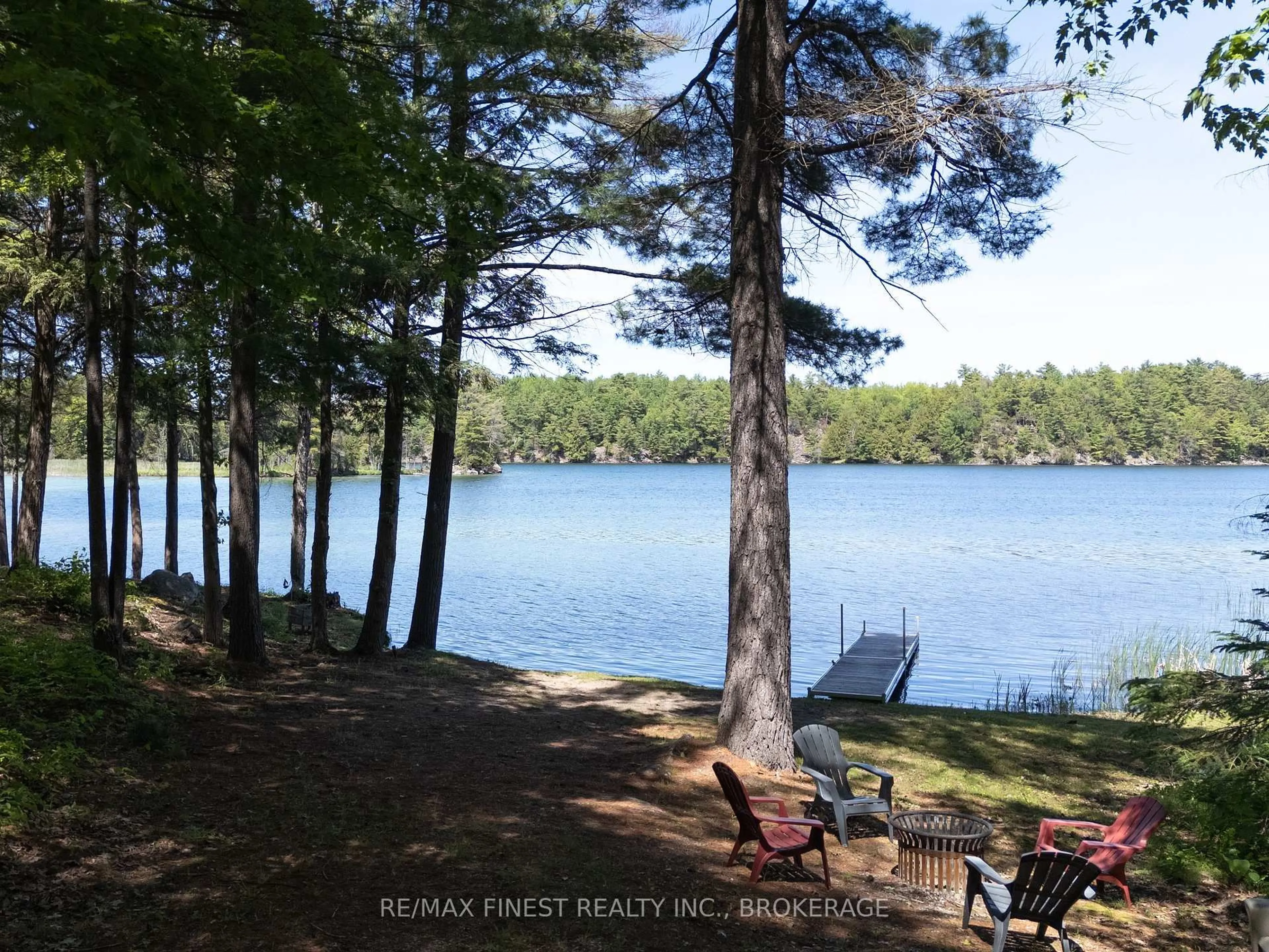 A pic from outside/outdoor area/front of a property/back of a property/a pic from drone, water/lake/river/ocean view for 1035 Cozy Ridge Lane, Hartington Ontario K0H 1W0