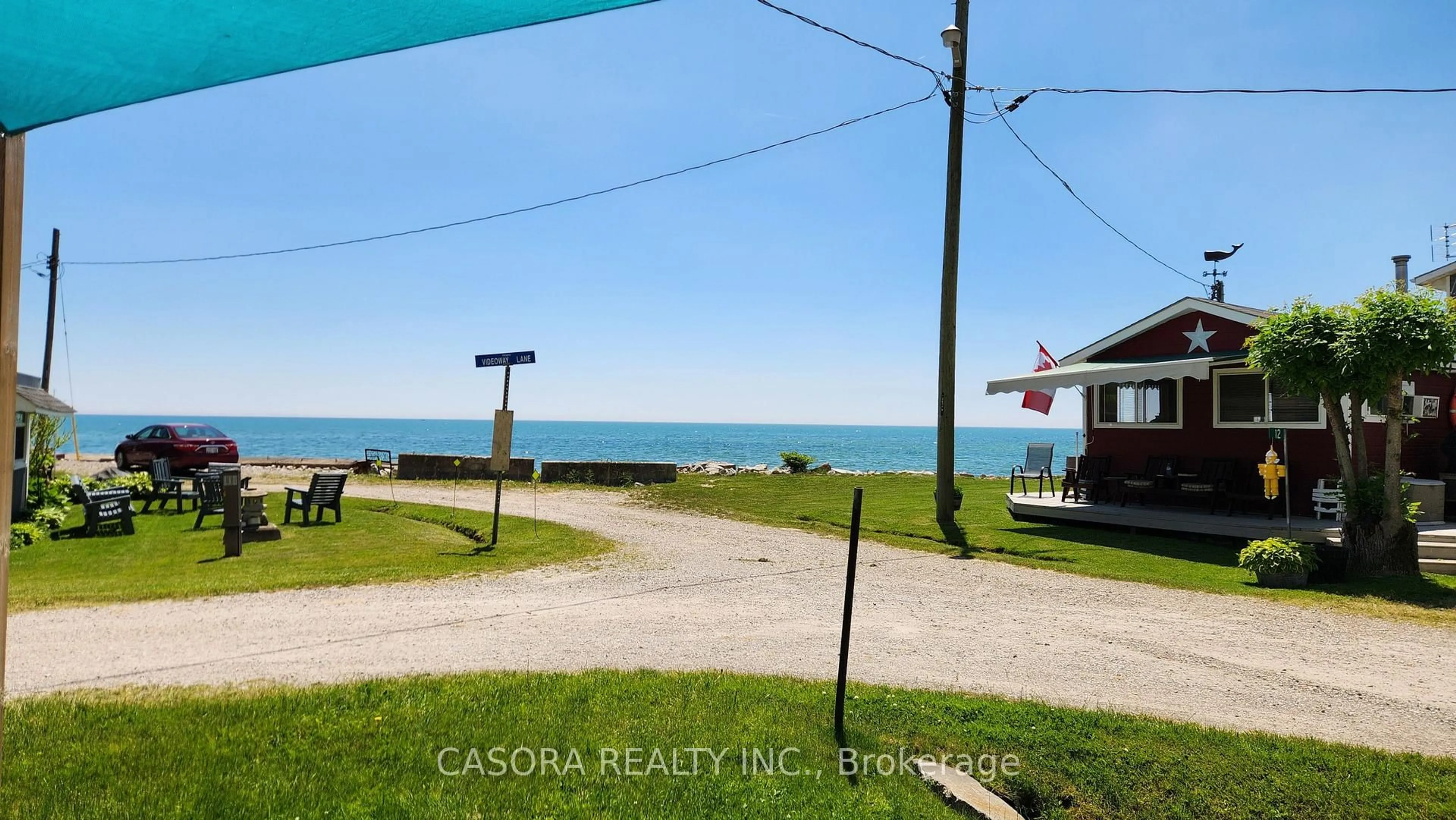 A pic from outside/outdoor area/front of a property/back of a property/a pic from drone, water/lake/river/ocean view for 7 Auld Lane, Haldimand Ontario N0A 1P0