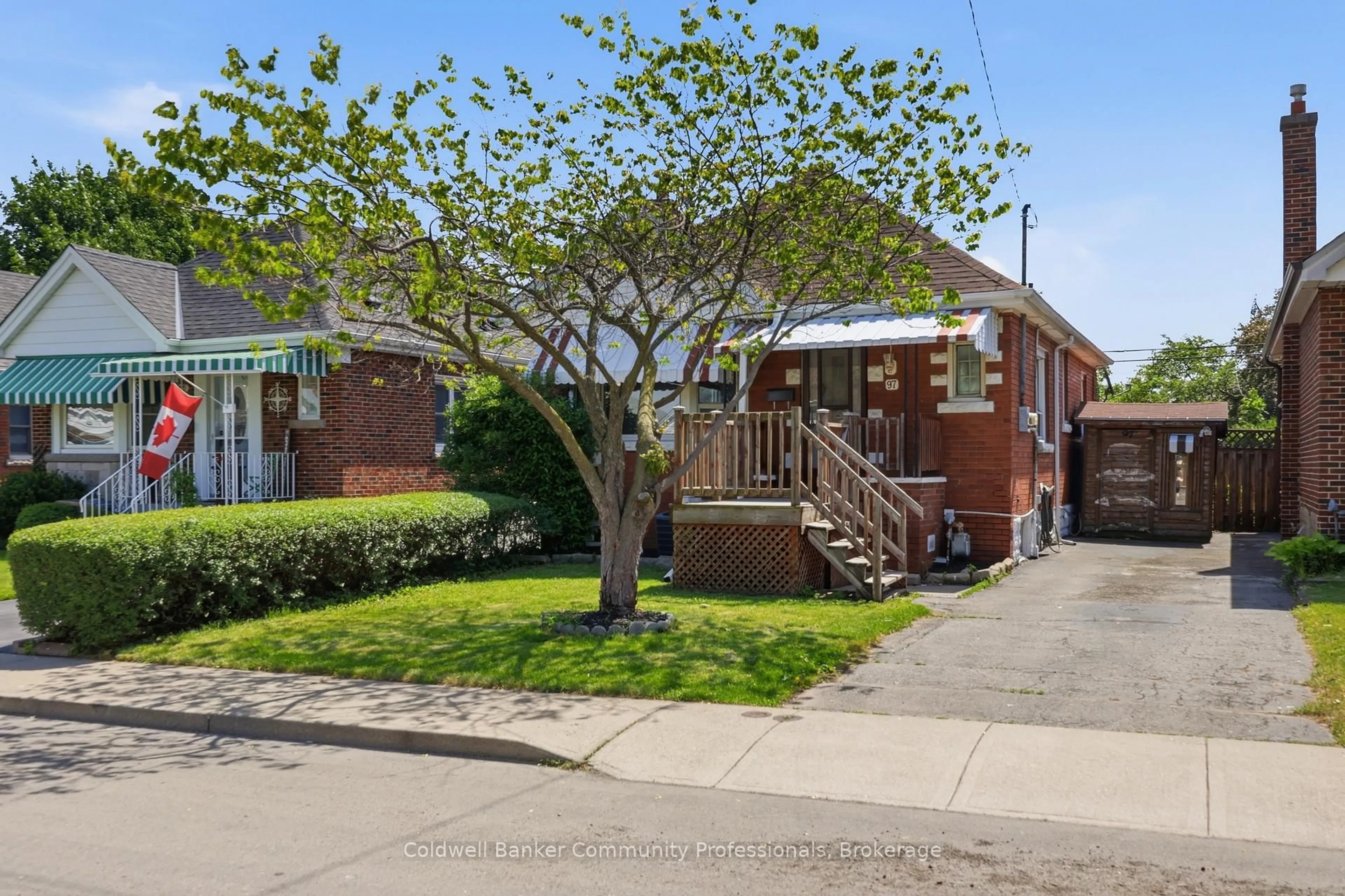 Home with brick exterior material, street for 97 Tragina Ave, Hamilton Ontario L8K 2Z4