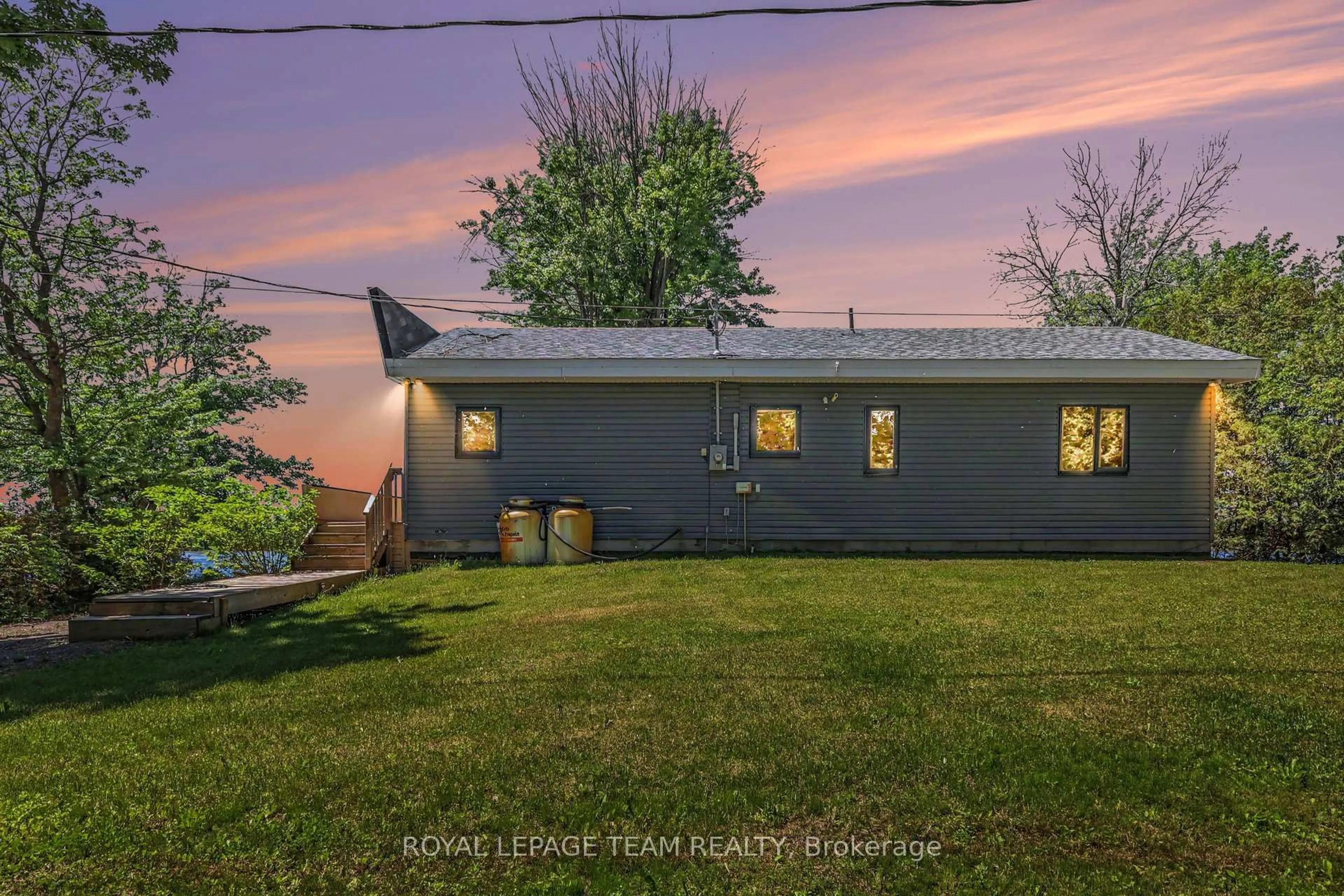 A pic from outside/outdoor area/front of a property/back of a property/a pic from drone, water/lake/river/ocean view for 5066K Lorne Bridge Rd, Ottawa Ontario K4M 1B4