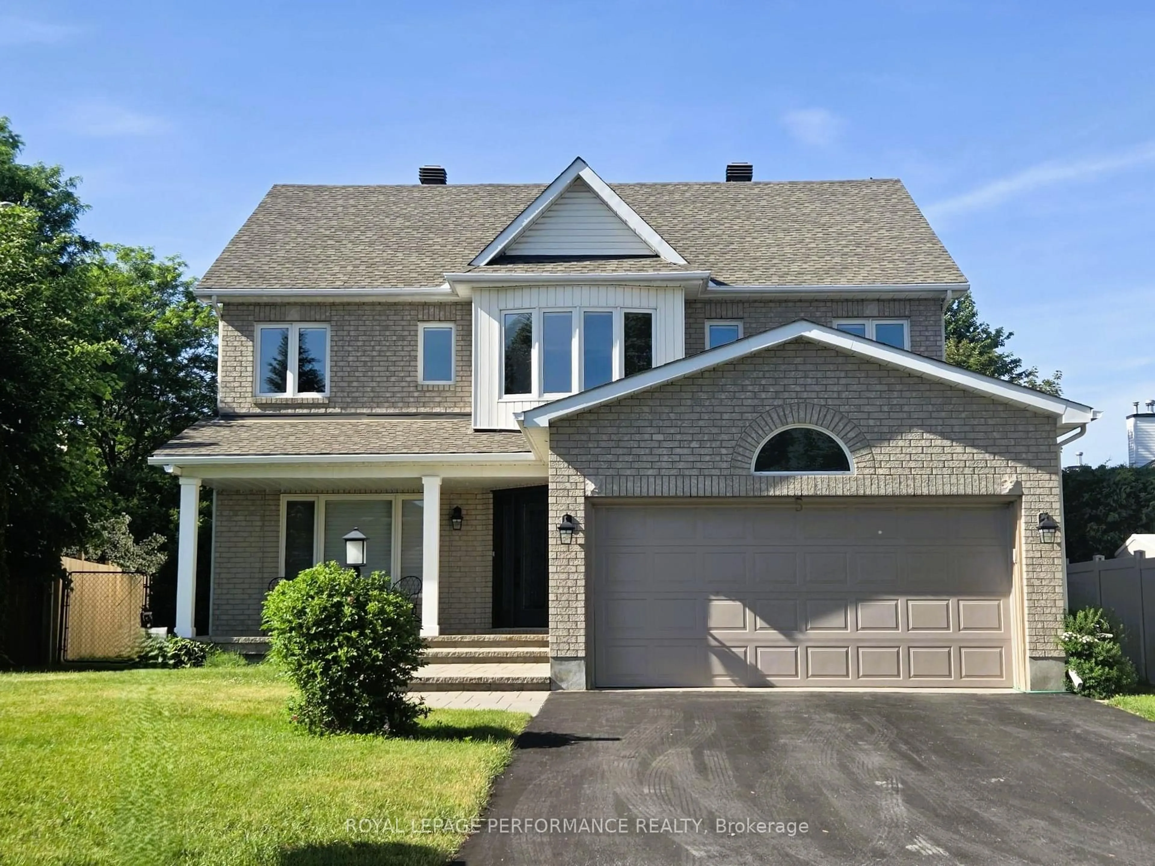 Home with vinyl exterior material, street for 5 Mayford Ave, Ottawa Ontario K2G 6A7
