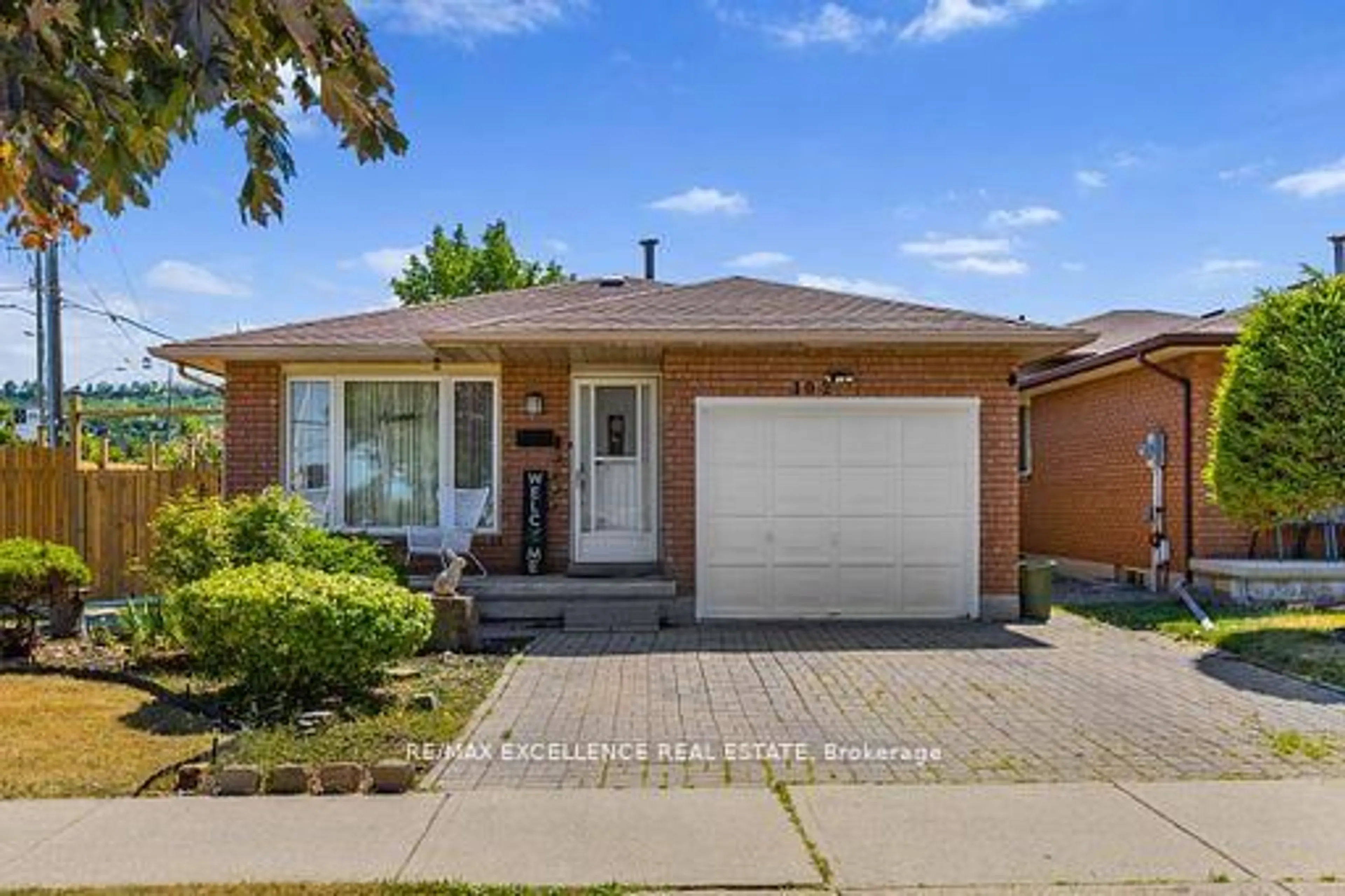 Home with brick exterior material, street for 102 Juniper Dr, Hamilton Ontario L8E 4G6