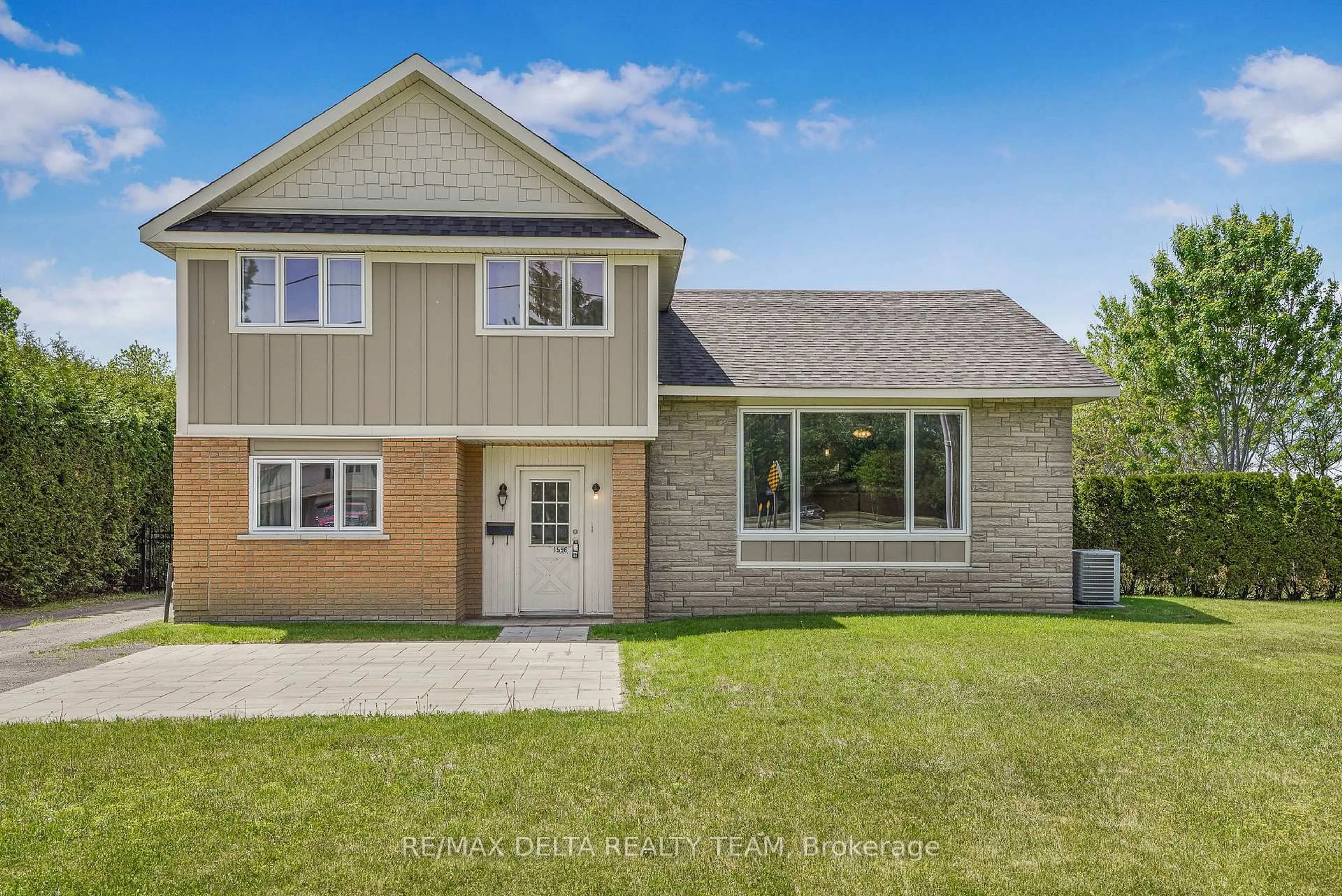 Home with vinyl exterior material, street for 1596 Boyer Rd, Ottawa Ontario K1C 1R2