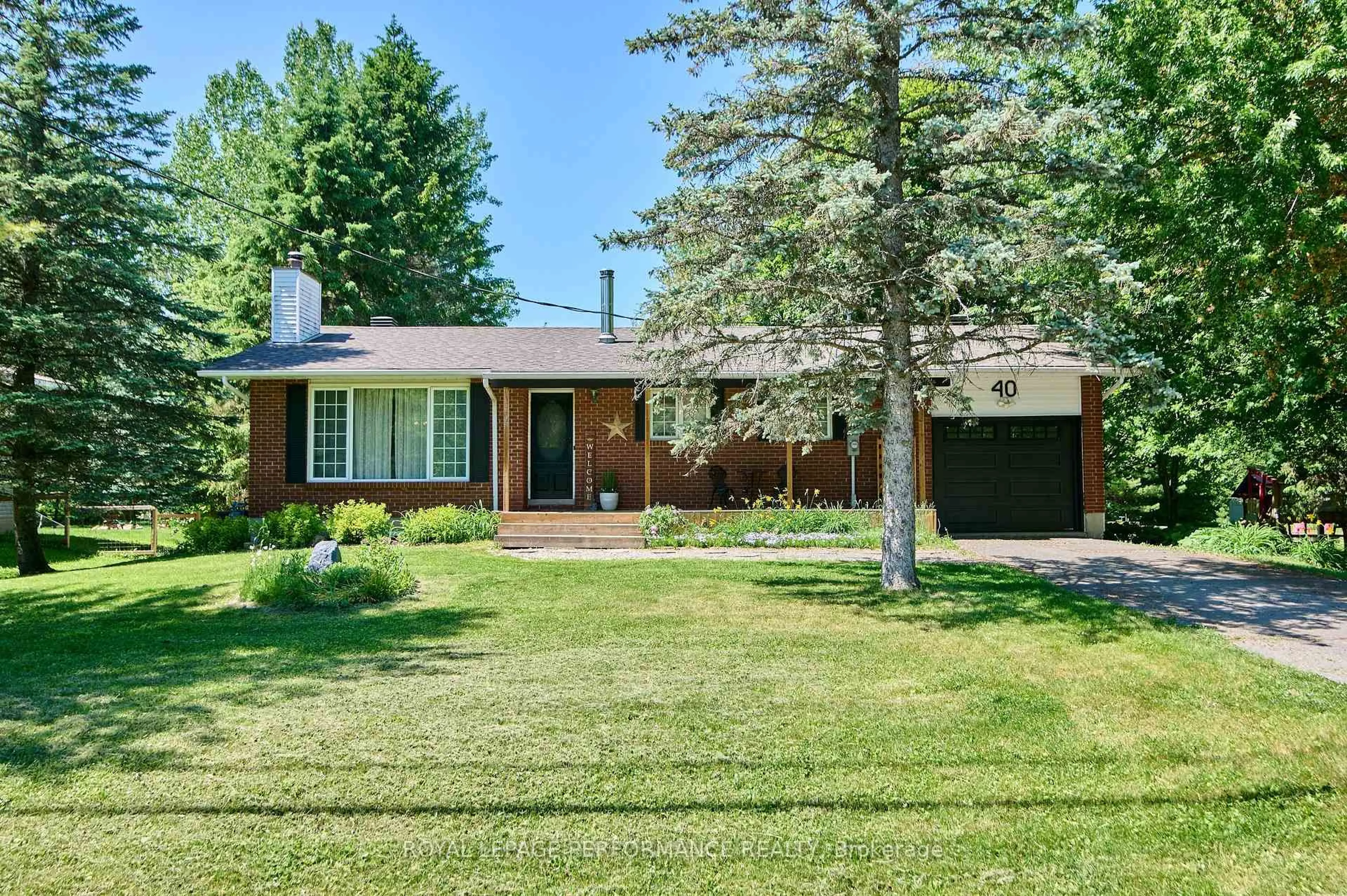 Home with brick exterior material, street for 40 Heritage Rd, Russell Ontario K4R 1A9