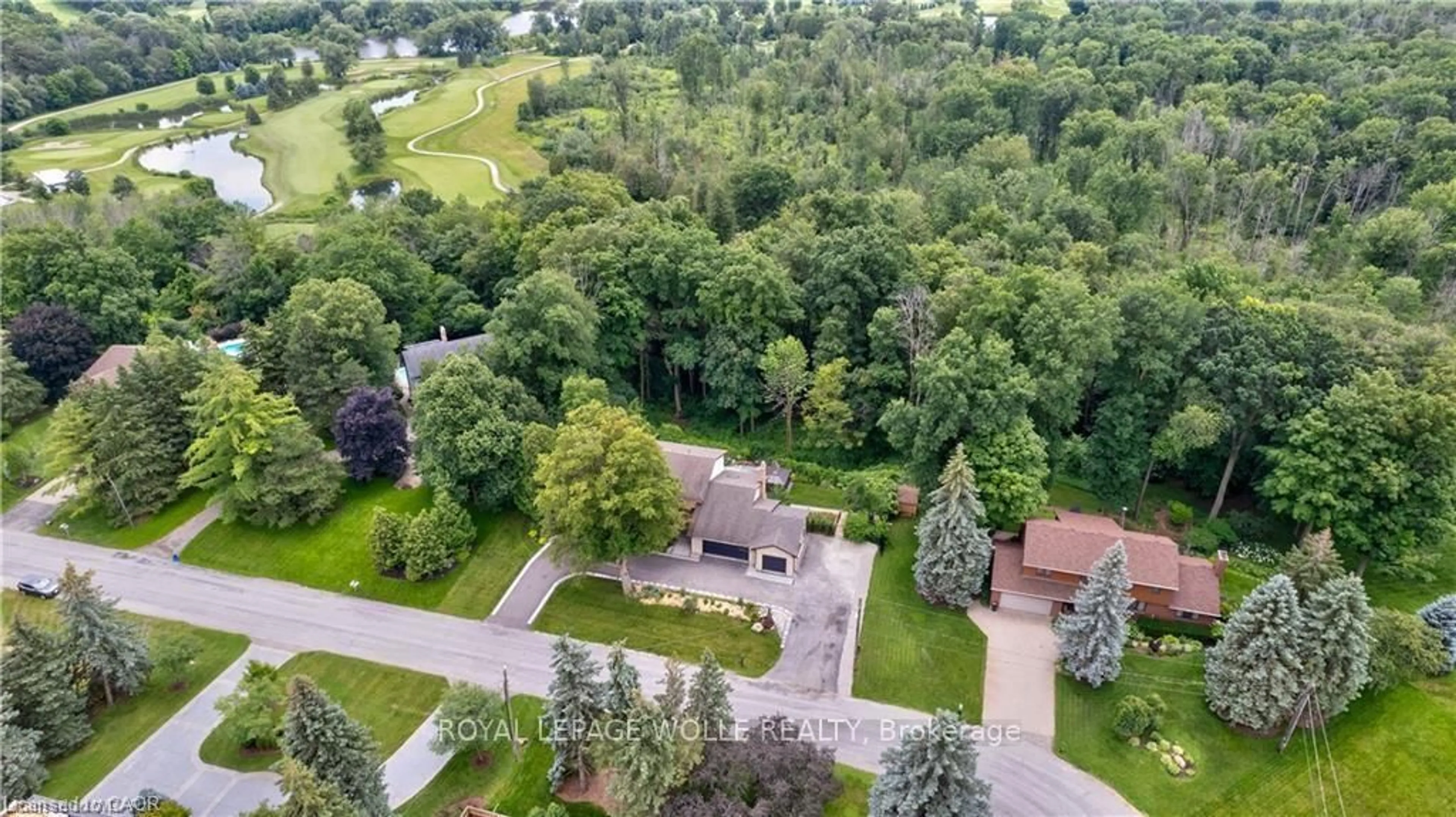 A pic from outside/outdoor area/front of a property/back of a property/a pic from drone, forest/trees view for 355 Edgehill Dr, Kitchener Ontario N2P 2C8