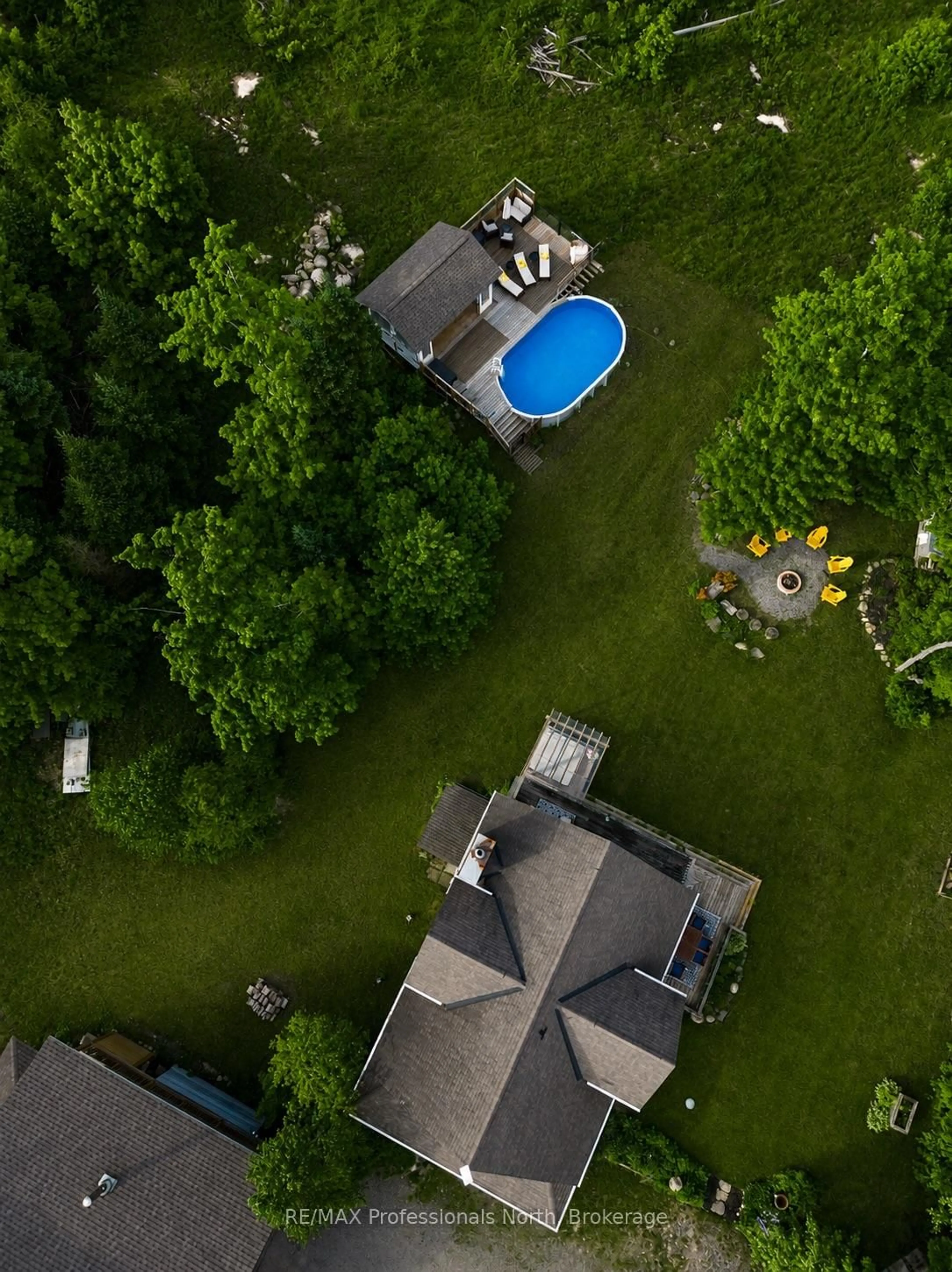 A pic from outside/outdoor area/front of a property/back of a property/a pic from drone, water/lake/river/ocean view for 1289 Purbrook Rd, Bracebridge Ontario P1L 1X3