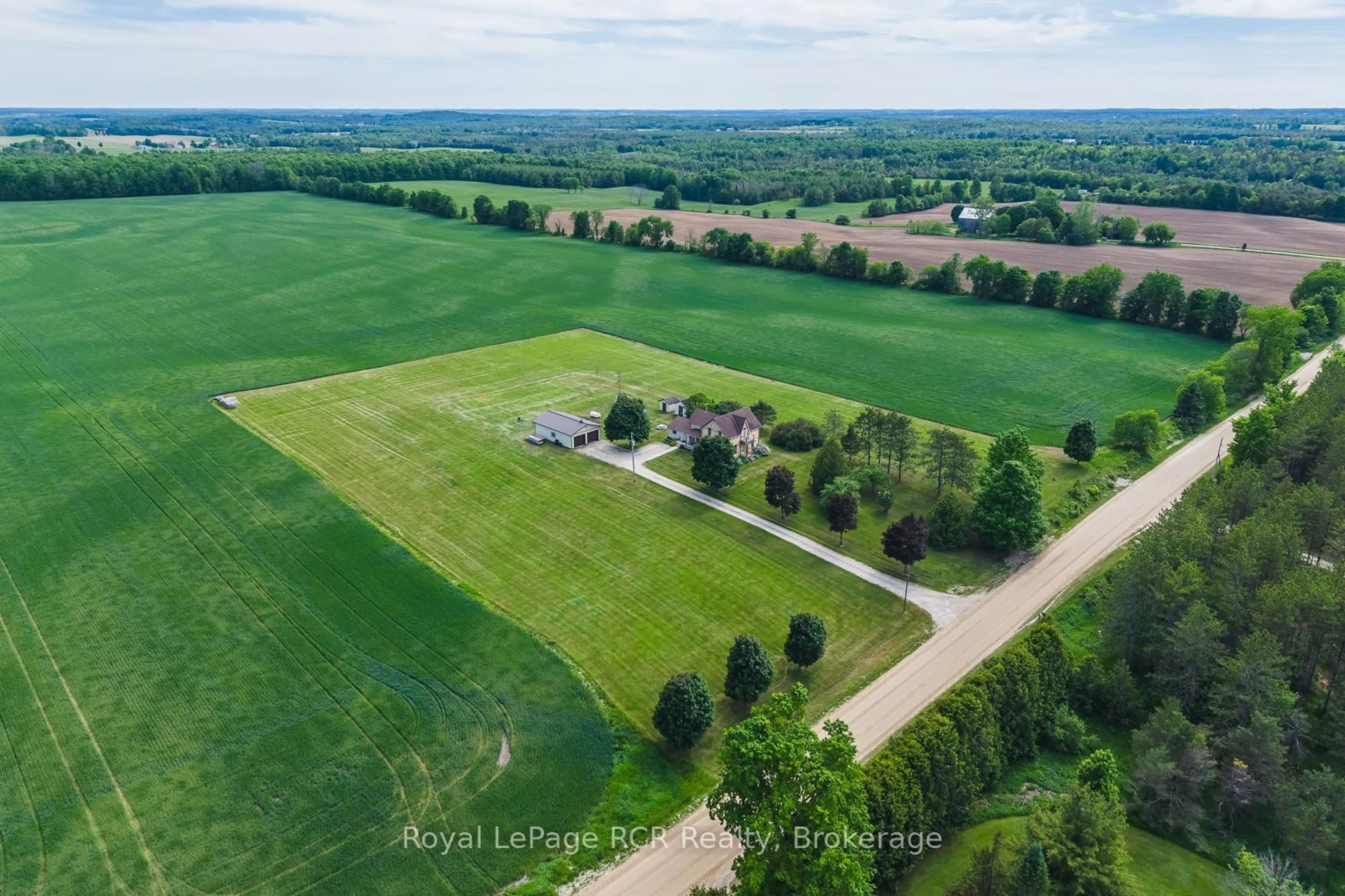 A pic from outside/outdoor area/front of a property/back of a property/a pic from drone, unknown for 441812 Concession 8 NDR Rd, West Grey Ontario N0G 1S0