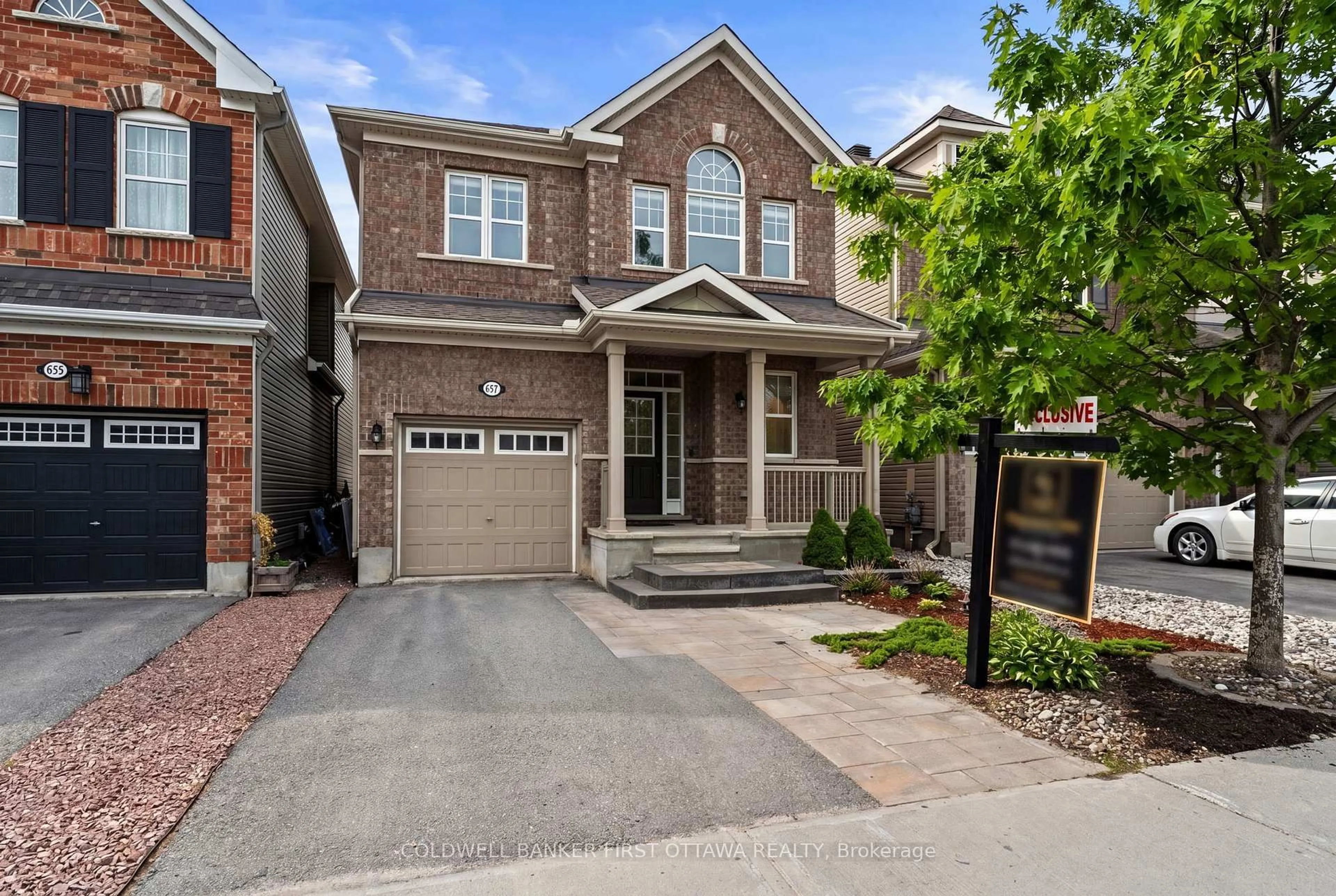 Home with brick exterior material, street for 657 DUNDONALD Dr, Ottawa Ontario K2J 6C6
