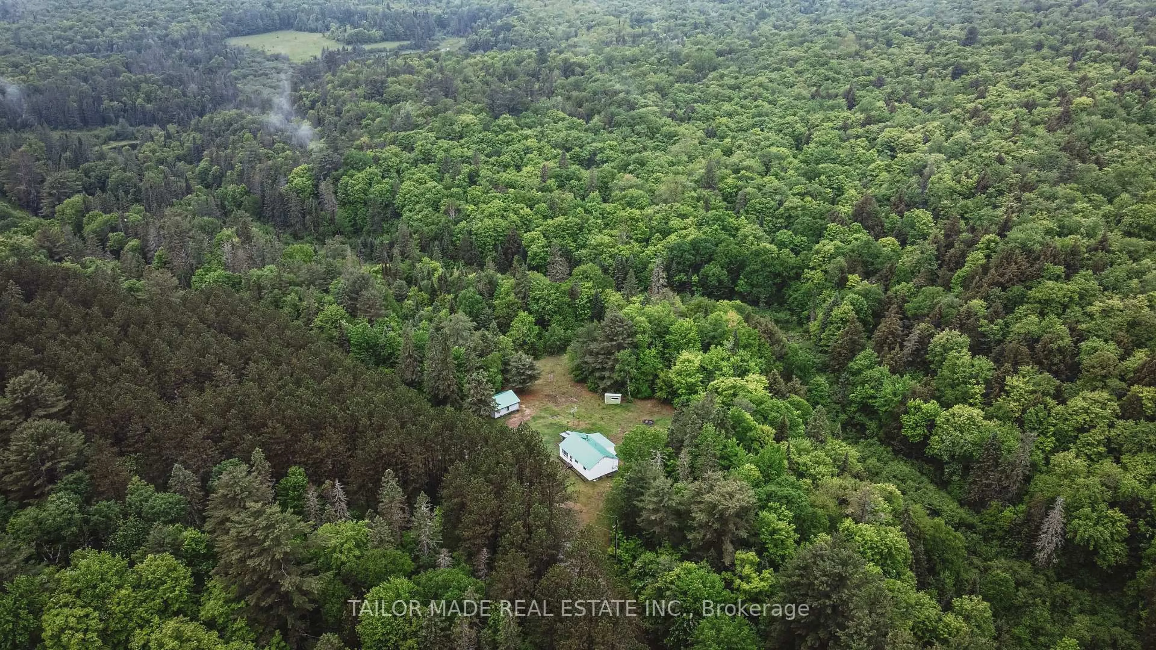A pic from outside/outdoor area/front of a property/back of a property/a pic from drone, forest/trees view for 788 Bothams Rd, Magnetawan Ontario P0A 1P0