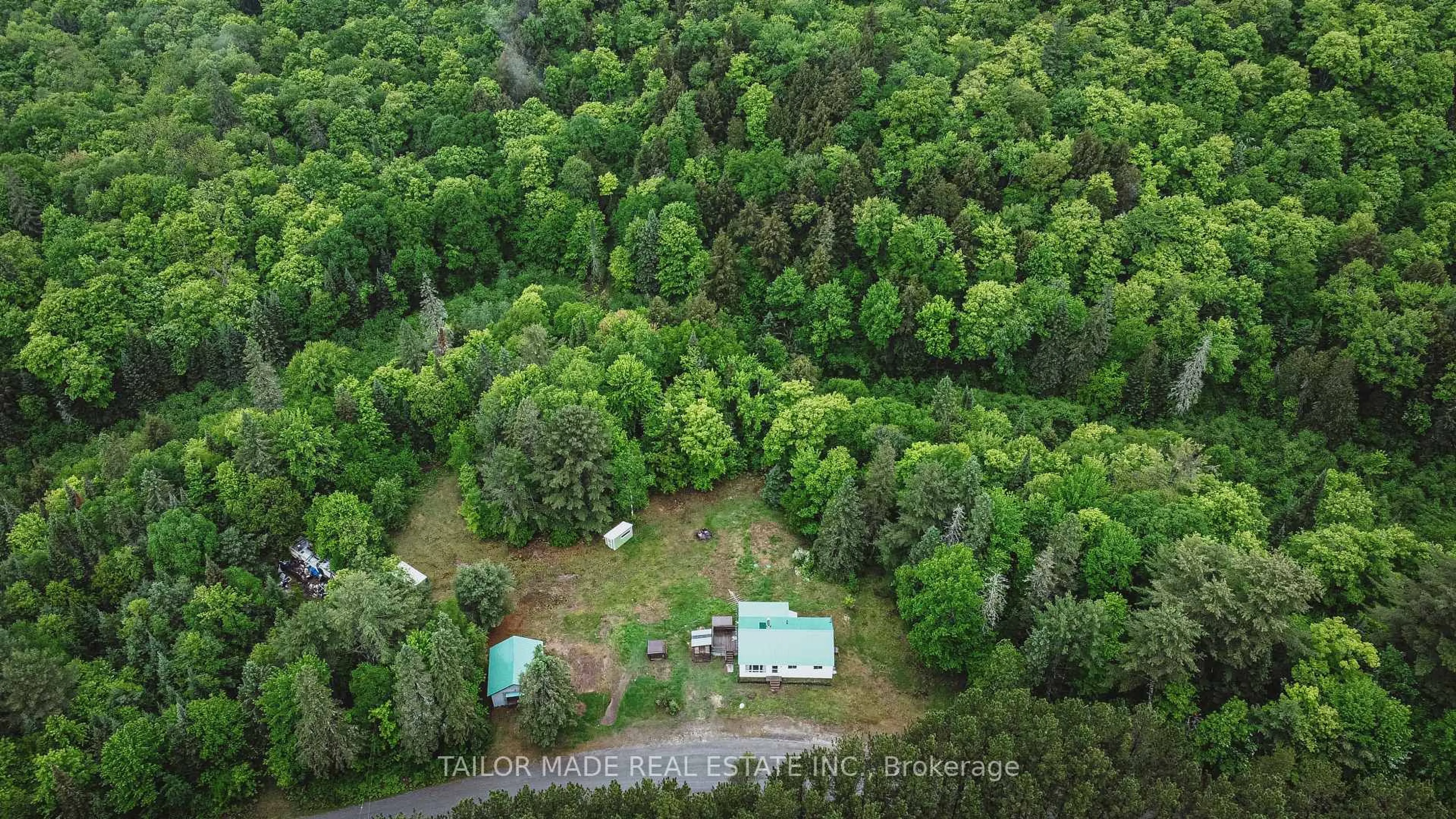 A pic from outside/outdoor area/front of a property/back of a property/a pic from drone, forest/trees view for 788 Bothams Rd, Magnetawan Ontario P0A 1P0