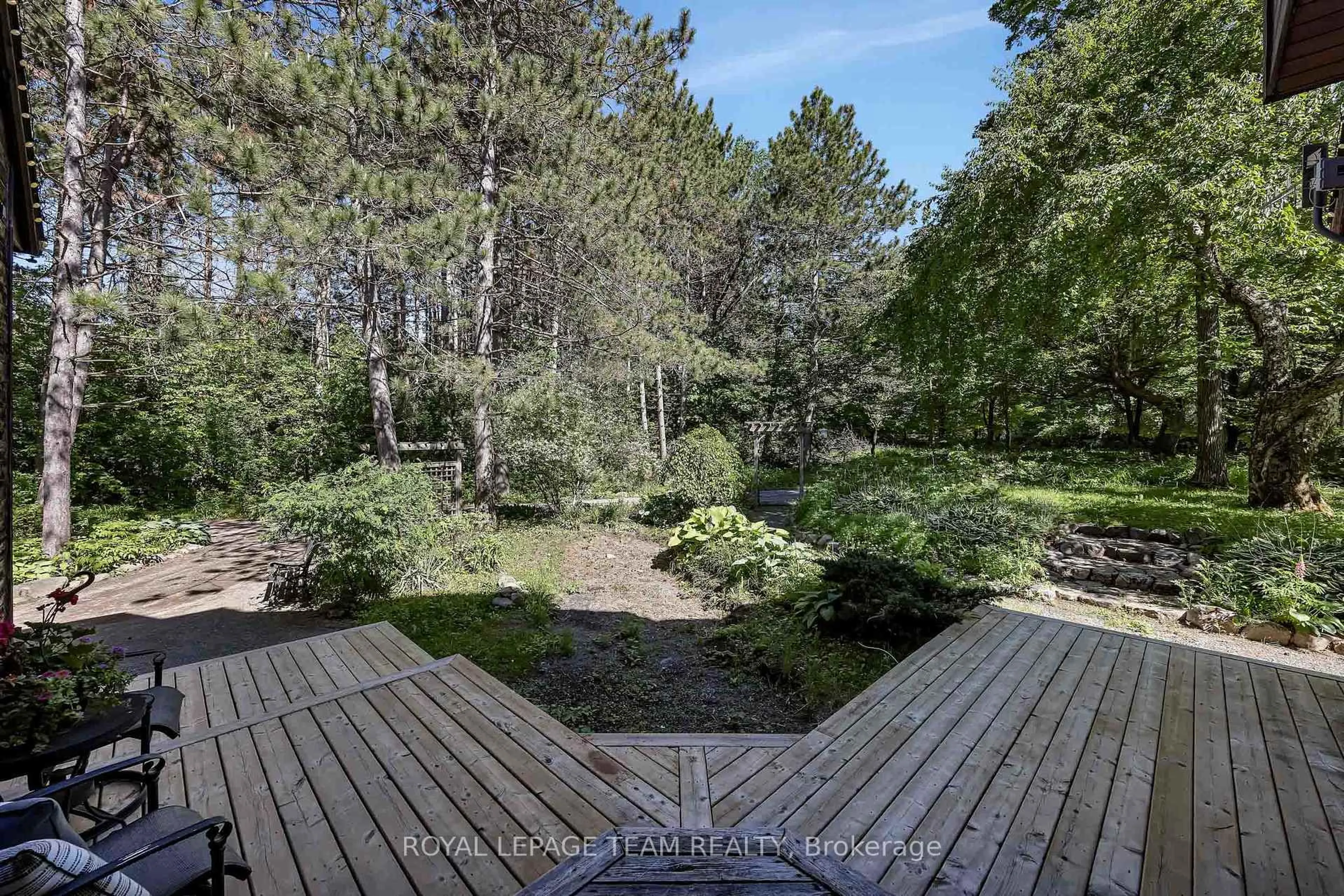 A pic from outside/outdoor area/front of a property/back of a property/a pic from drone, forest/trees view for 104 Sol Lane, Ottawa Ontario K0A 3M0