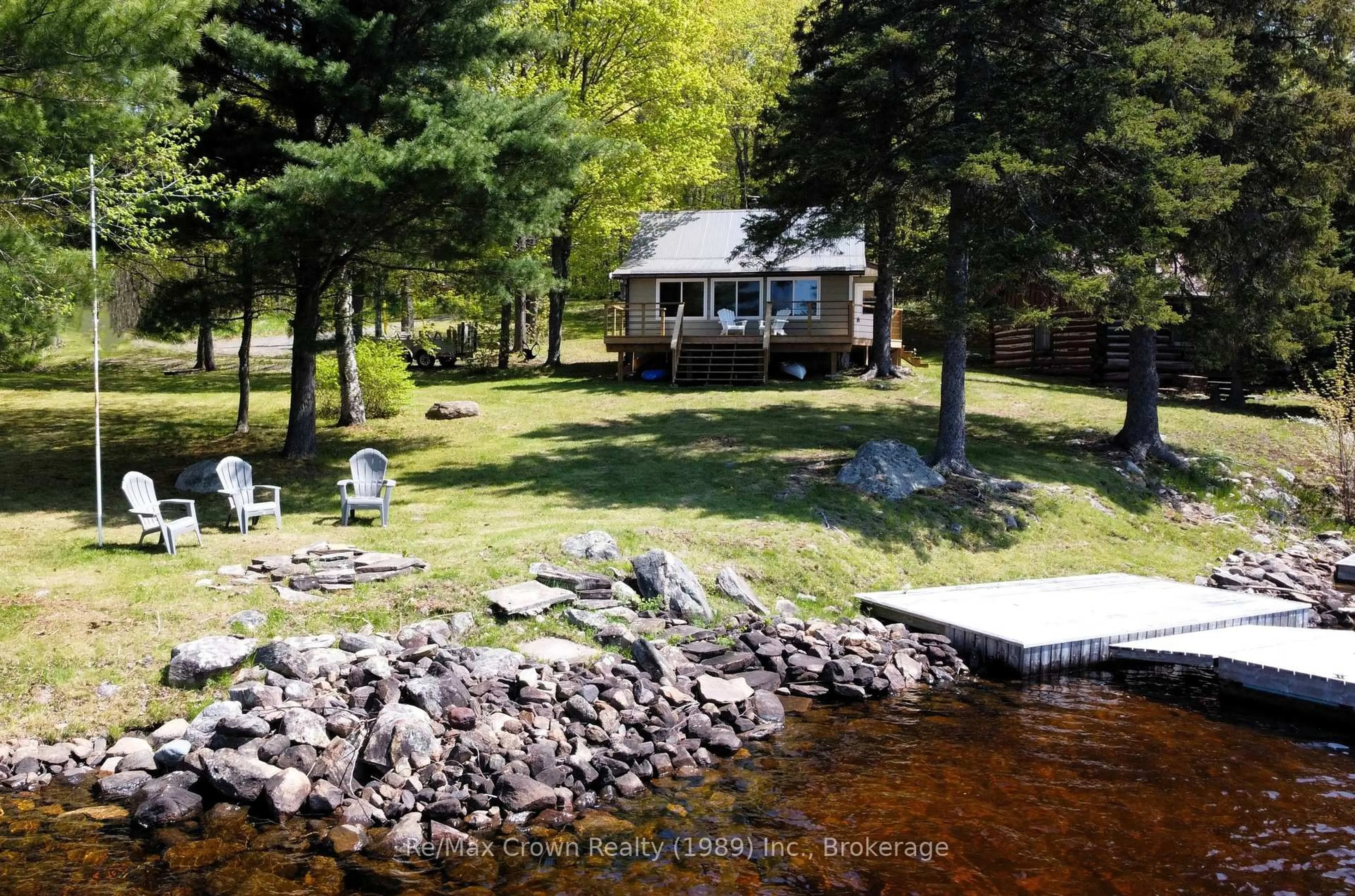 A pic from outside/outdoor area/front of a property/back of a property/a pic from drone, water/lake/river/ocean view for 131 Lee Lane, Parry Sound Remote Area Ontario P0H 1S0