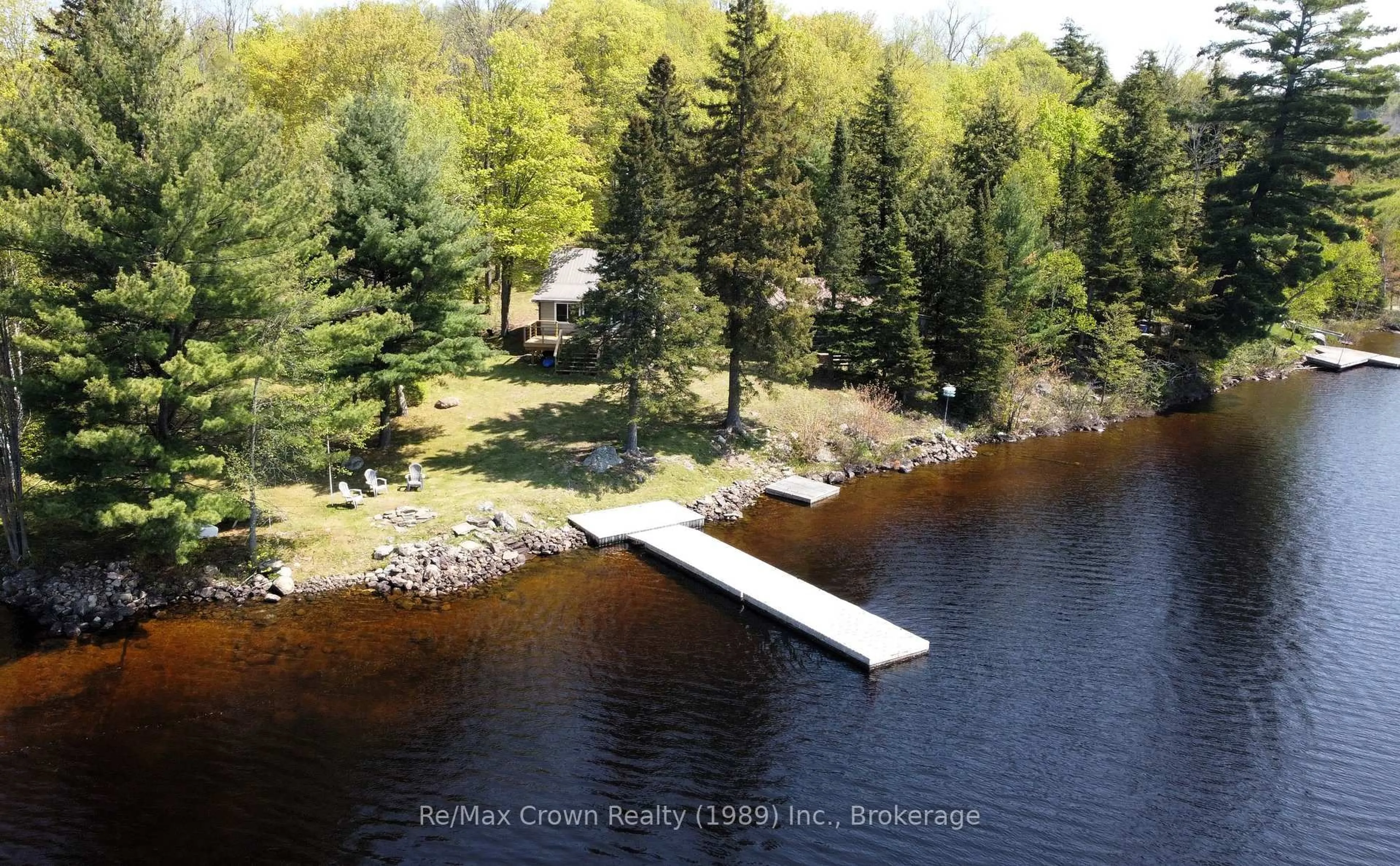 A pic from outside/outdoor area/front of a property/back of a property/a pic from drone, water/lake/river/ocean view for 131 Lee Lane, Parry Sound Remote Area Ontario P0H 1S0