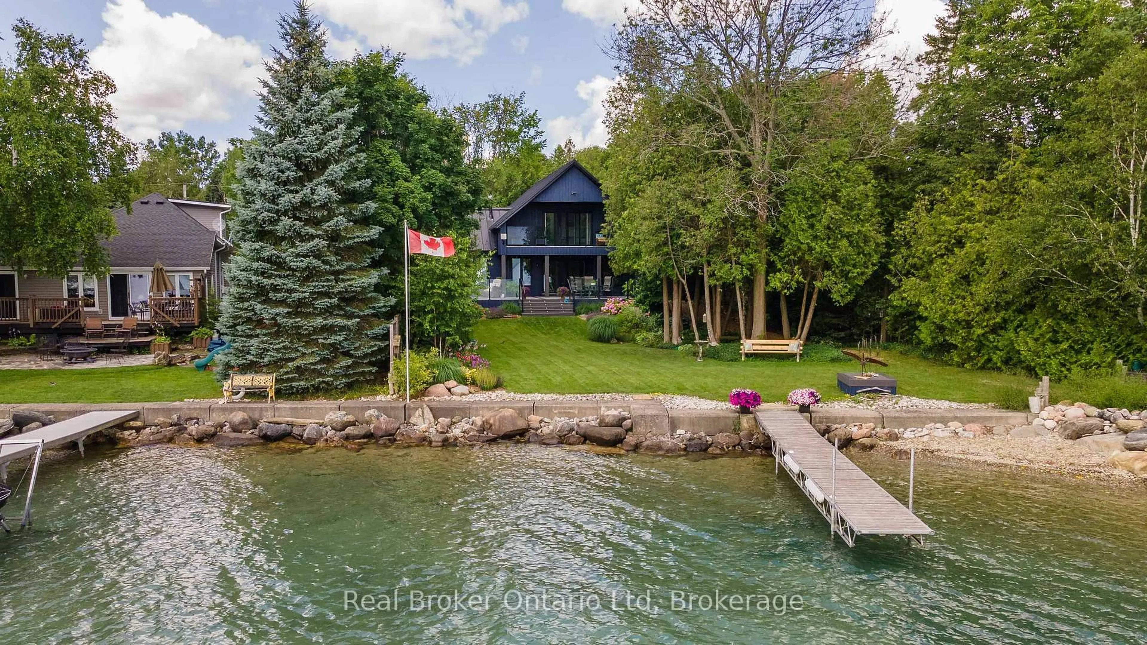 A pic from outside/outdoor area/front of a property/back of a property/a pic from drone, water/lake/river/ocean view for 339595 Presqu'ile Rd, Georgian Bluffs Ontario N0H 1S0