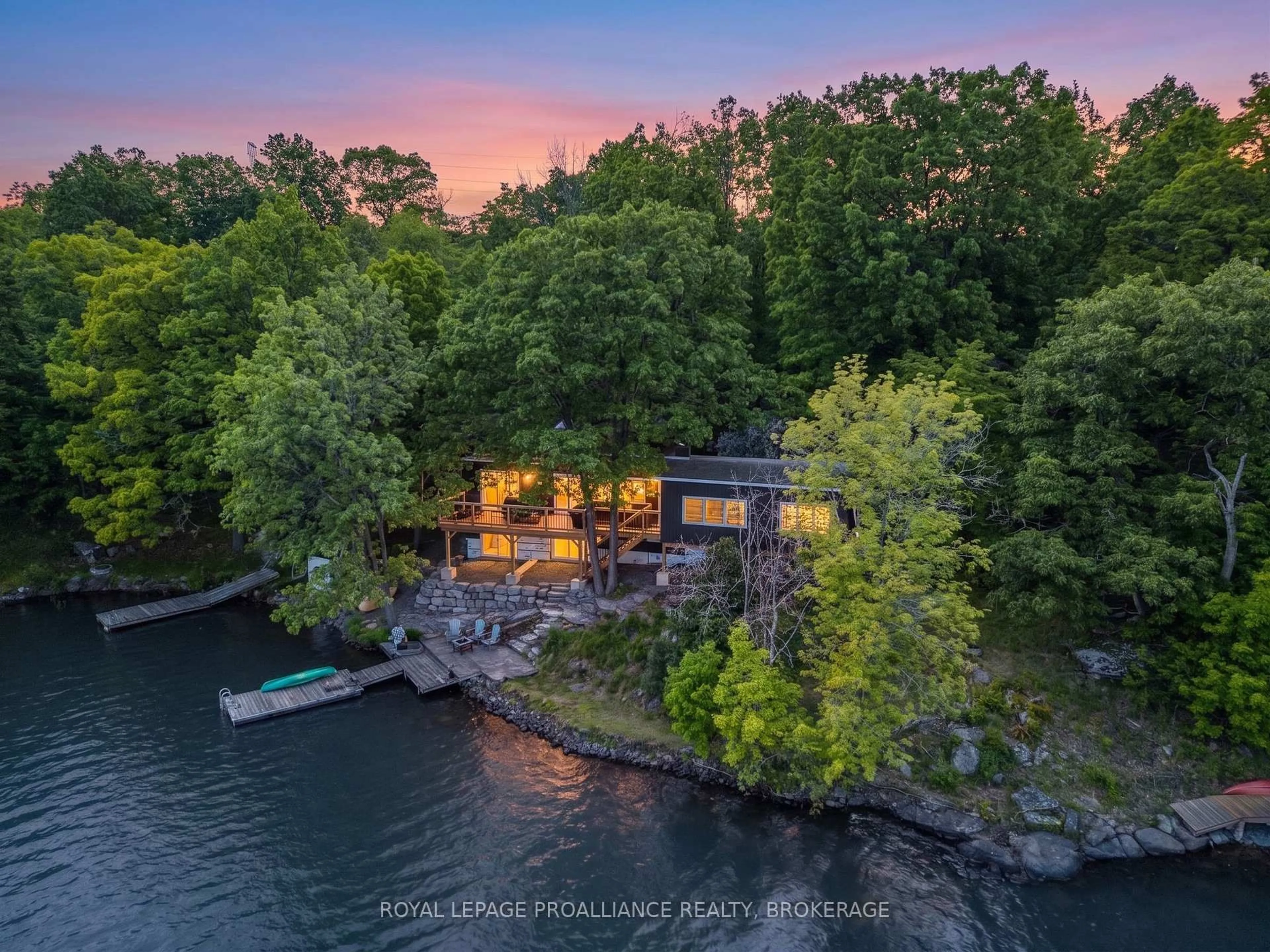 A pic from outside/outdoor area/front of a property/back of a property/a pic from drone, water/lake/river/ocean view for 402 Troy Lake Rd, Rideau Lakes Ontario K0G 1E0