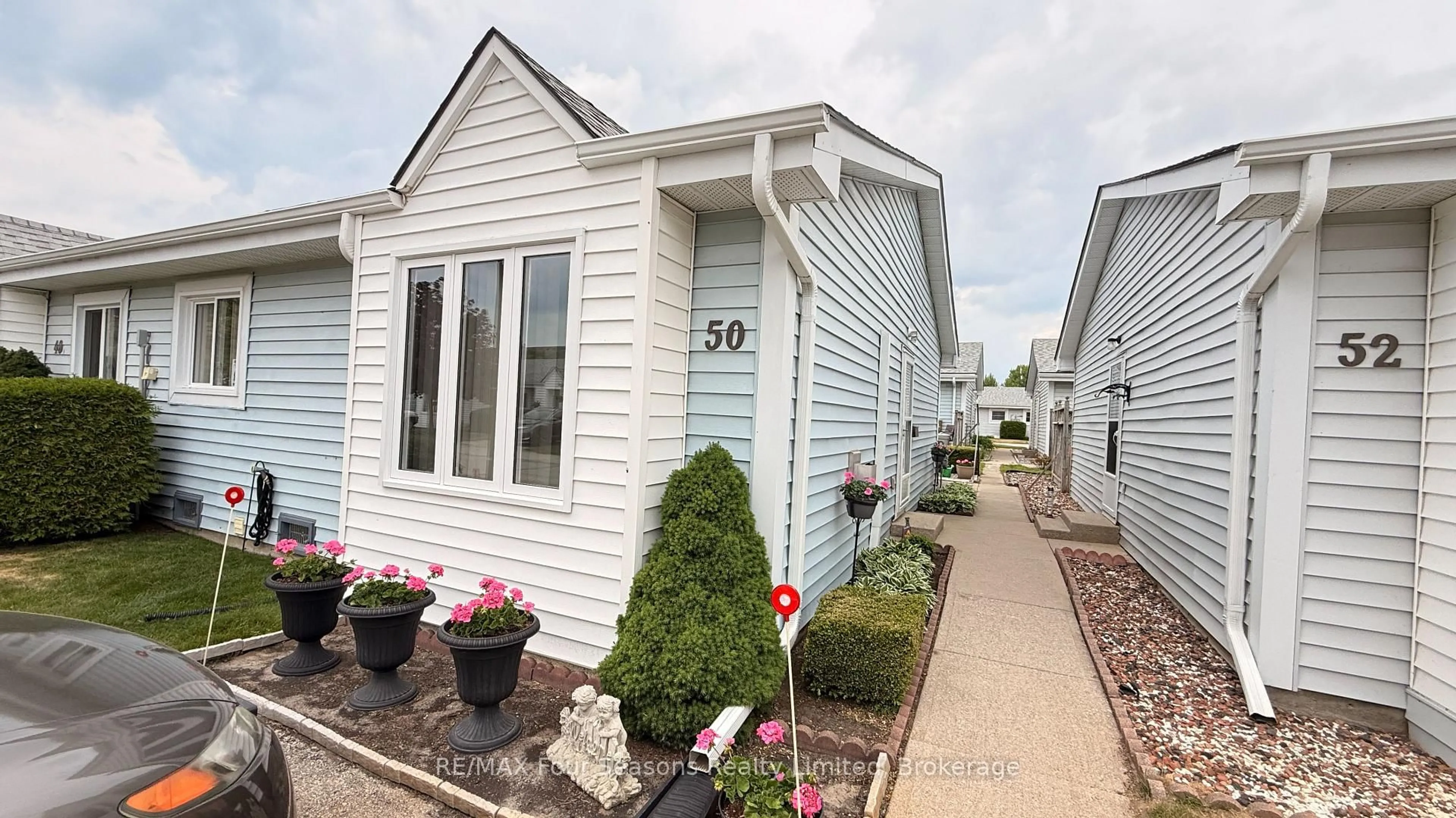 Home with vinyl exterior material, street for 303 Waterloo St #50, Saugeen Shores Ontario N0H 2C1