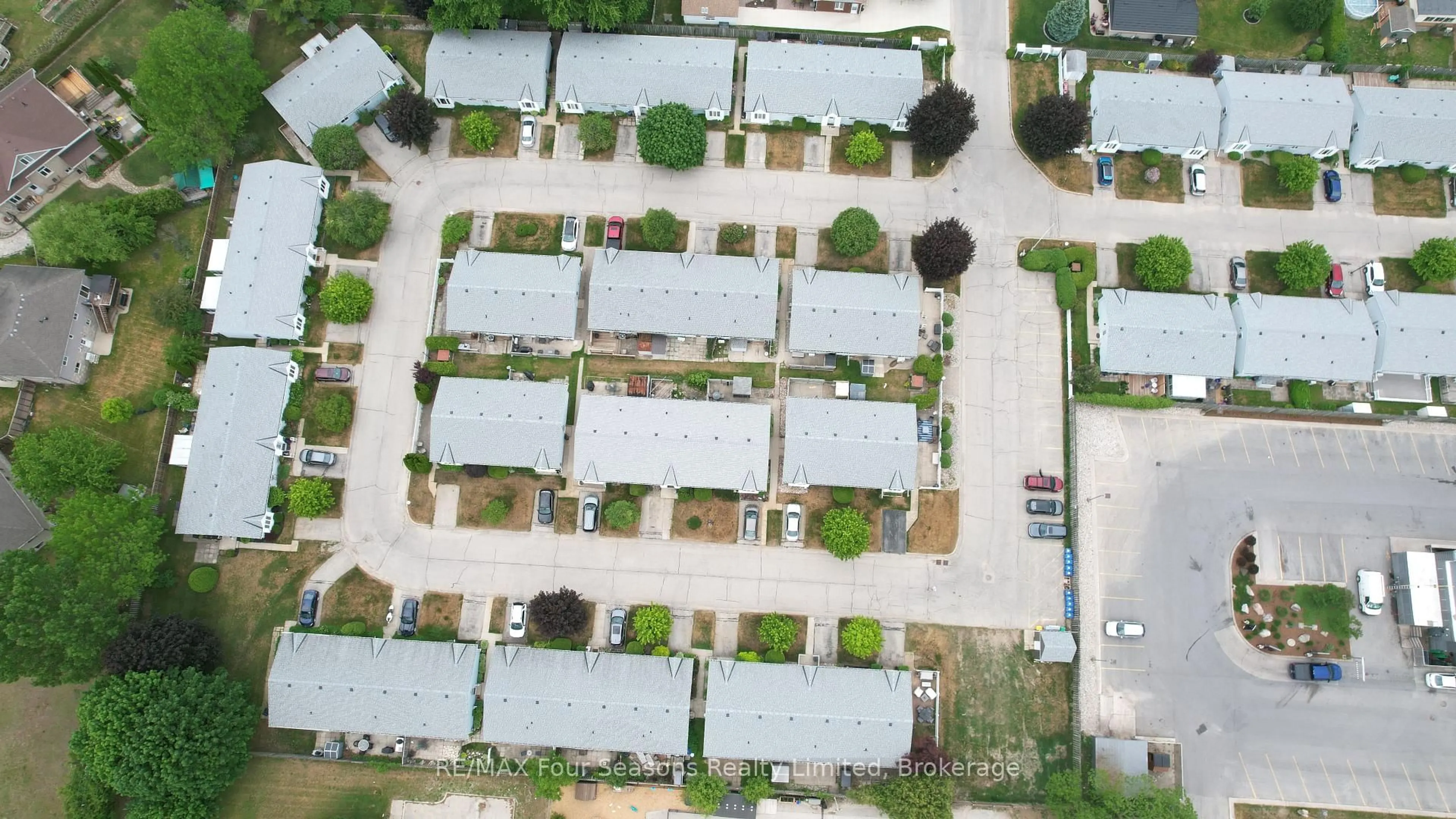 A pic from outside/outdoor area/front of a property/back of a property/a pic from drone, street for 303 Waterloo St #50, Saugeen Shores Ontario N0H 2C1