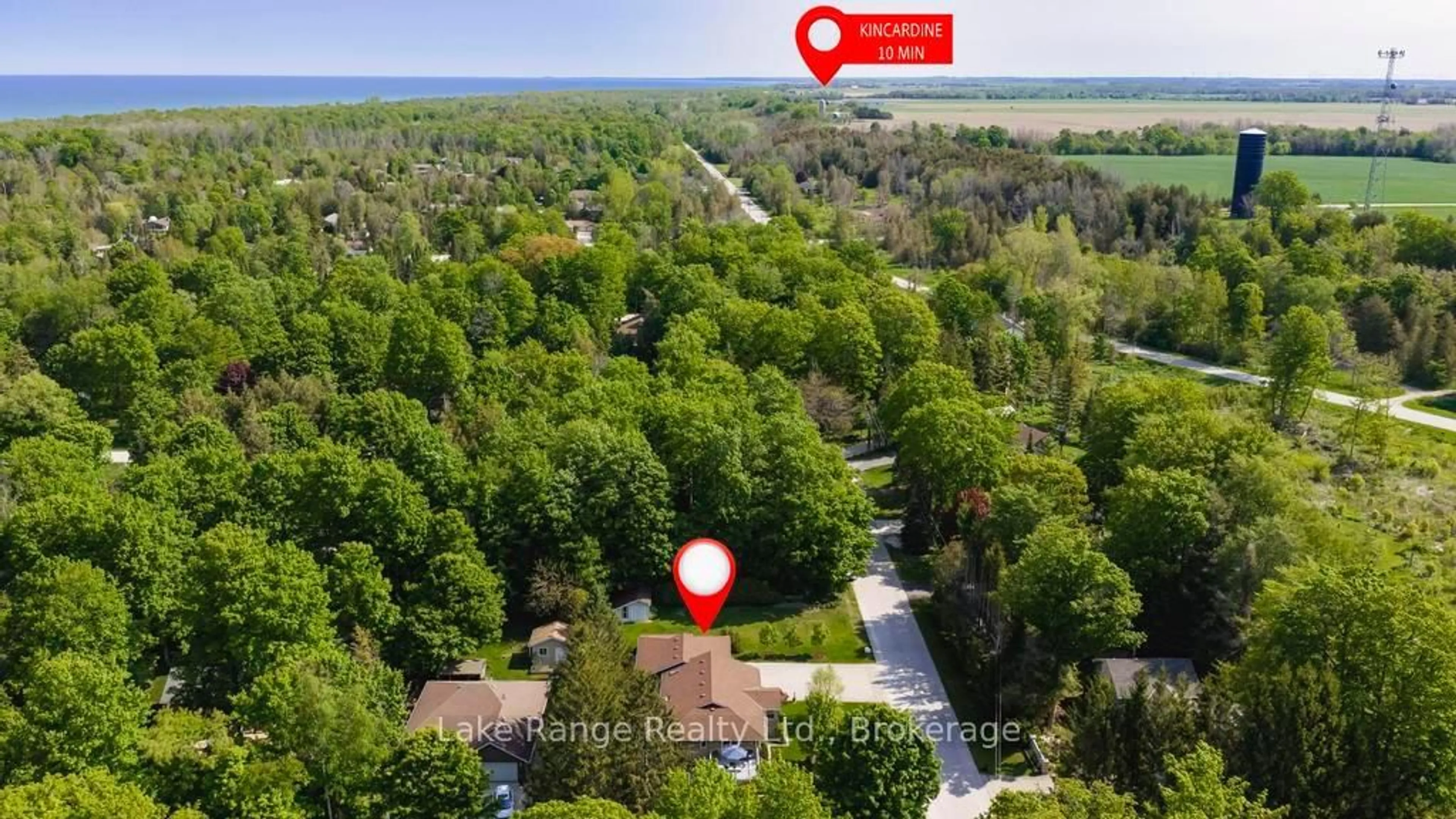 A pic from outside/outdoor area/front of a property/back of a property/a pic from drone, forest/trees view for 201 Shadywood Cres, Huron-Kinloss Ontario N2Z 2X3