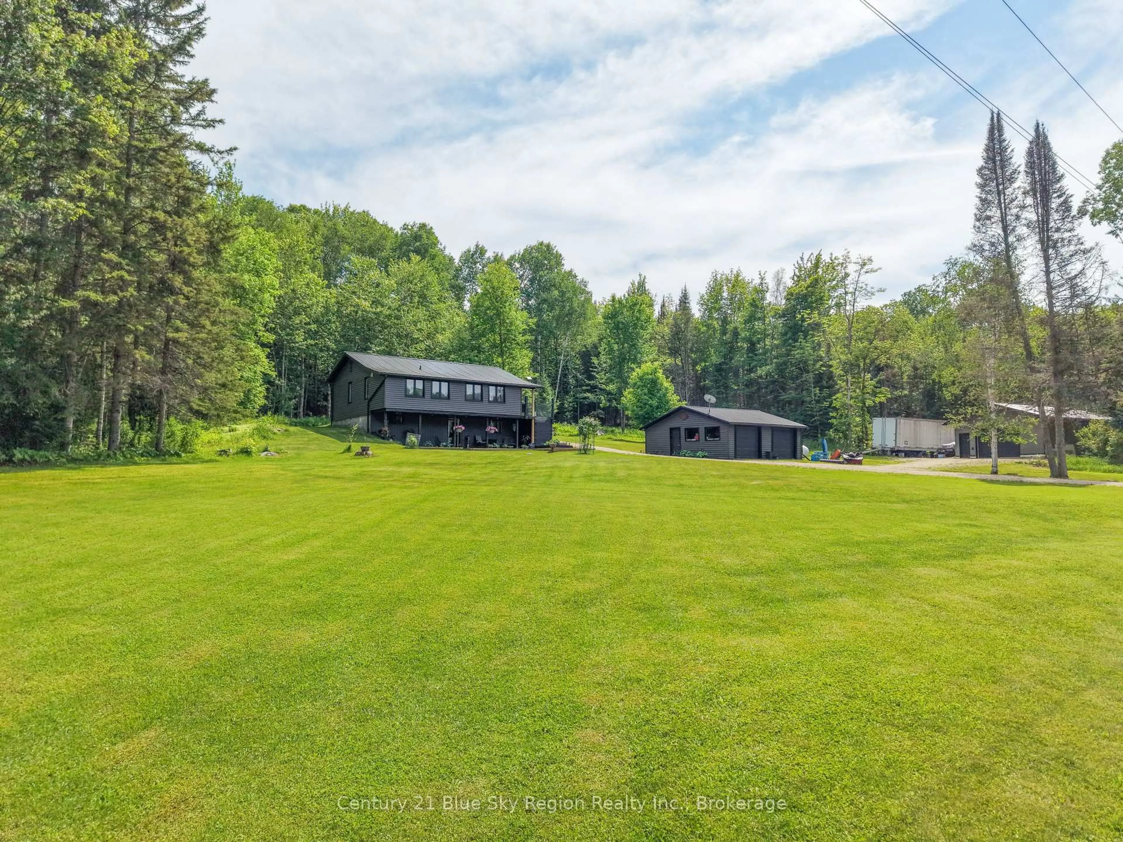 A pic from outside/outdoor area/front of a property/back of a property/a pic from drone, water/lake/river/ocean view for 2803 Highway 534, Nipissing Ontario P0H 1W0