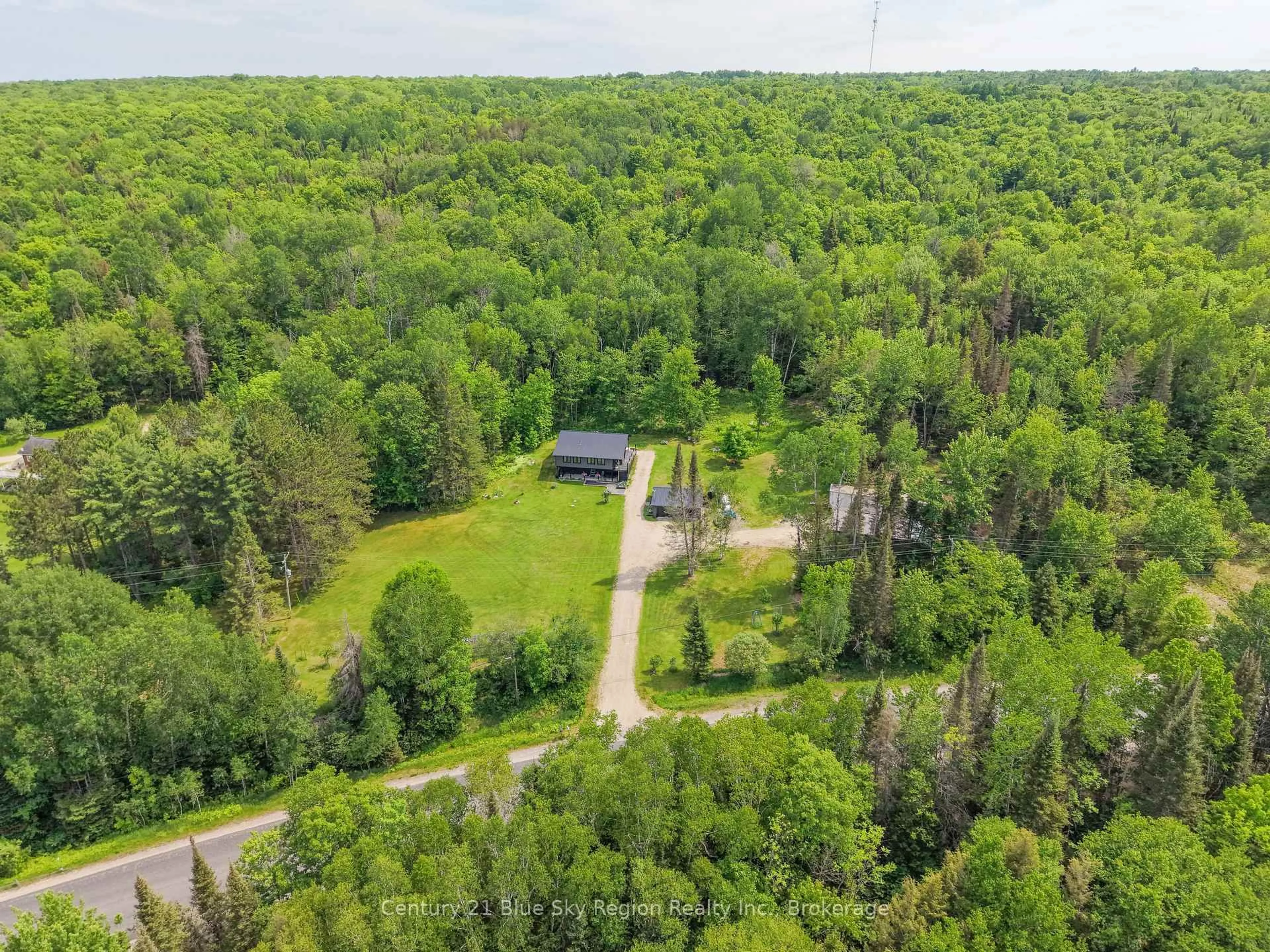 A pic from outside/outdoor area/front of a property/back of a property/a pic from drone, forest/trees view for 2803 Highway 534, Nipissing Ontario P0H 1W0
