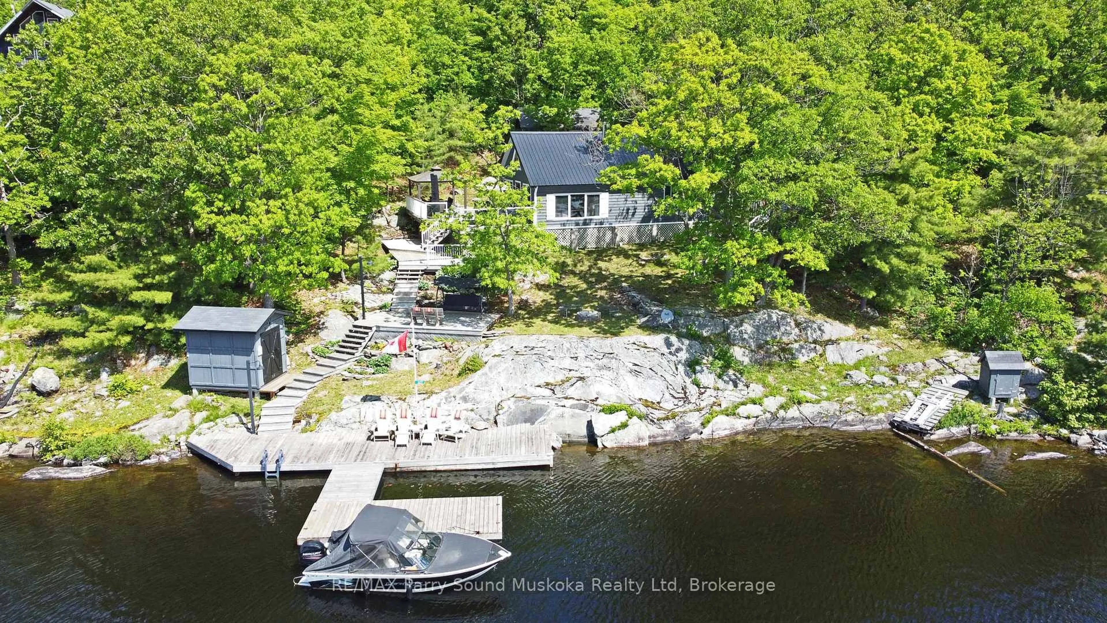 A pic from outside/outdoor area/front of a property/back of a property/a pic from drone, water/lake/river/ocean view for 322 Healey Lake Way, The Archipelago Ontario P0C 1H0