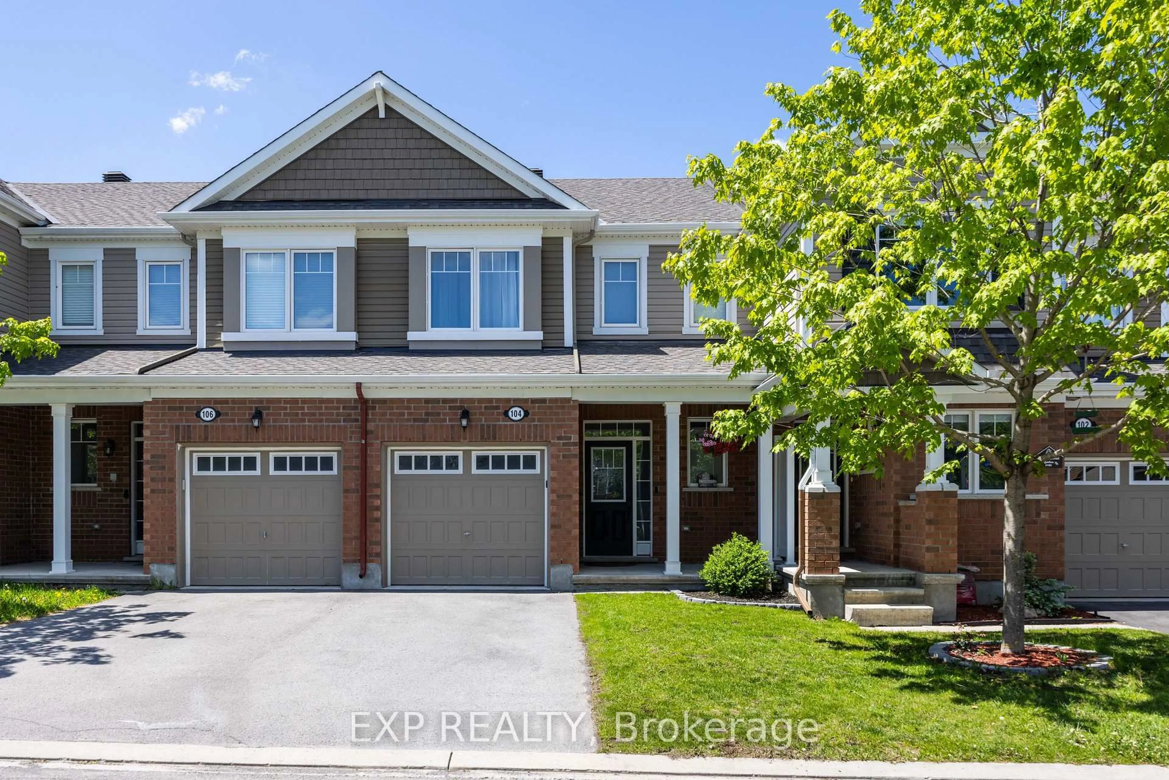 Home with brick exterior material, street for 104 Conifer Creek Circ, Ottawa Ontario K2M 0L7