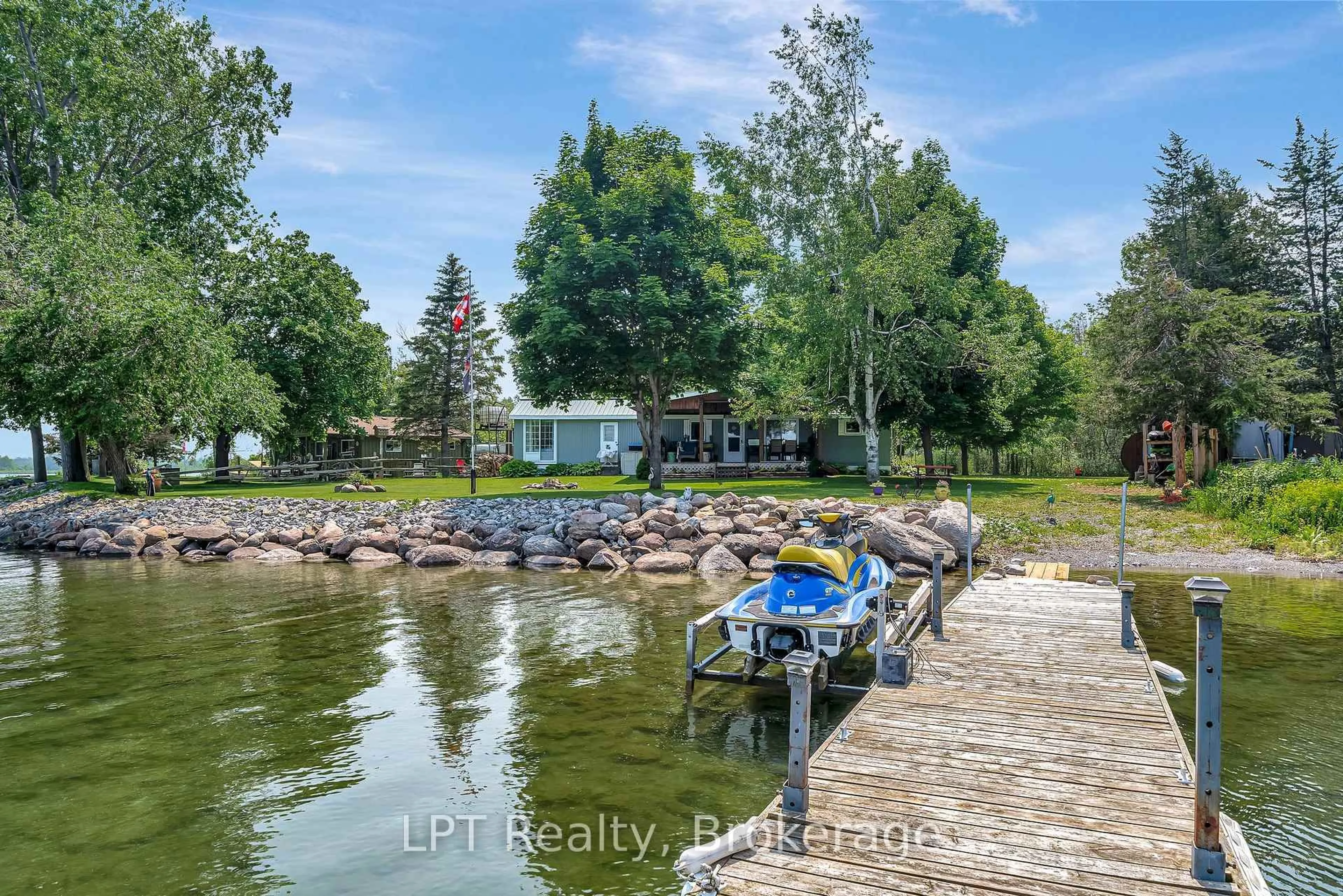 A pic from outside/outdoor area/front of a property/back of a property/a pic from drone, water/lake/river/ocean view for 85 Pirates Cove Lane, Prince Edward County Ontario K0K 2P0