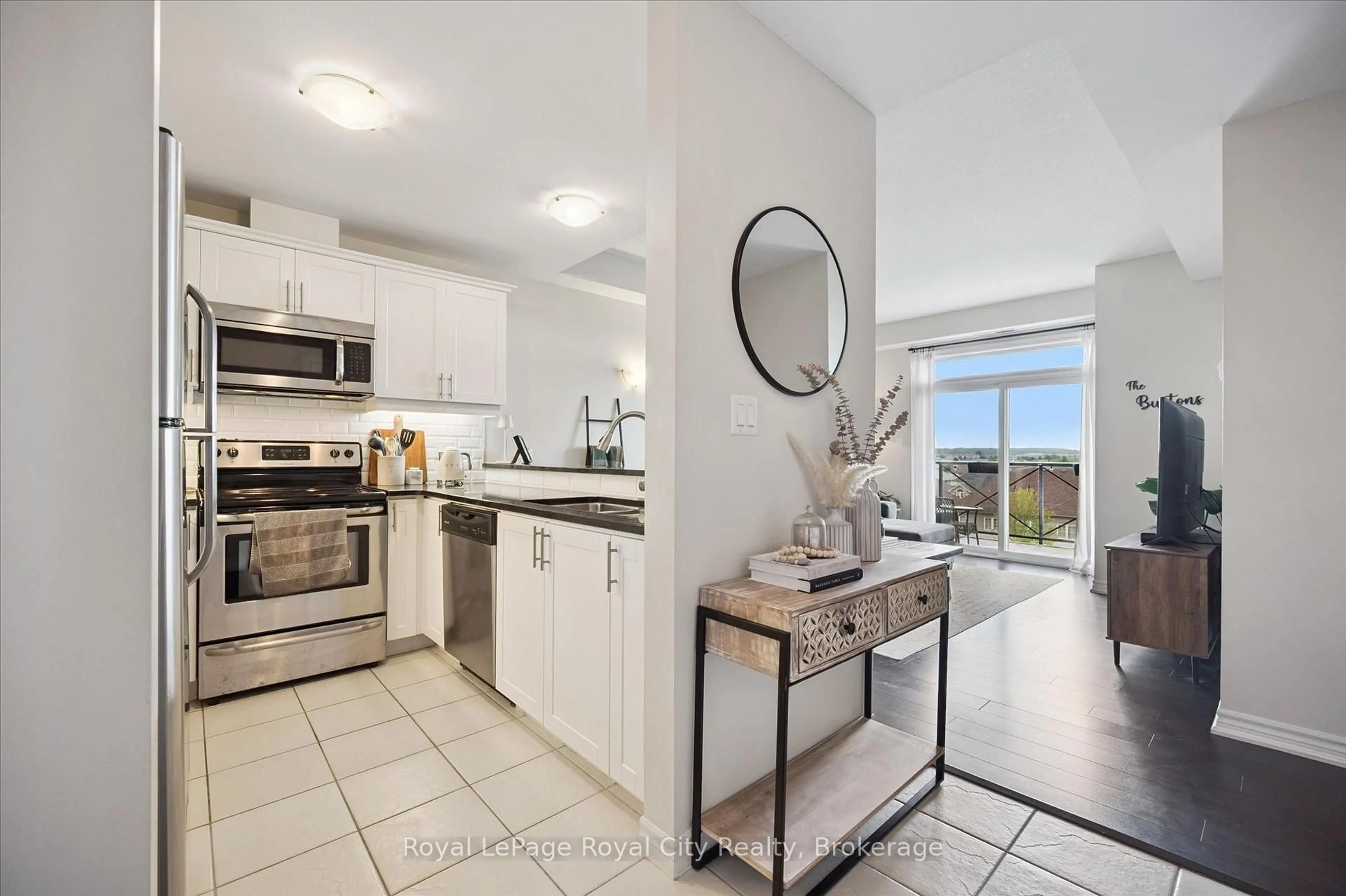 Open concept kitchen, ceramic/tile floor for 2 Colonial Dr #403, Guelph Ontario N1L 0K8