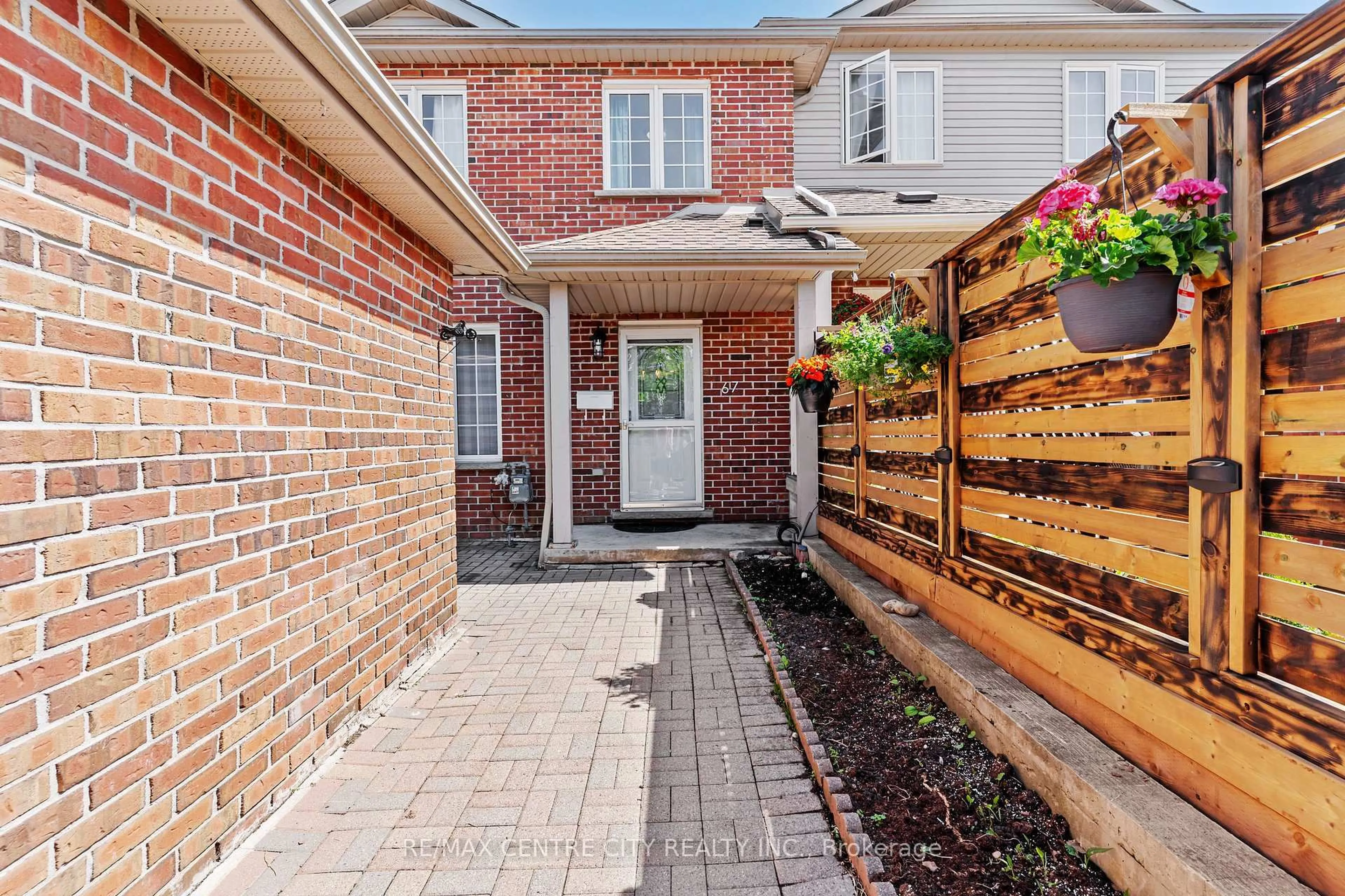 Home with brick exterior material, street for 67 Ralgreen Cres, Kitchener Ontario N2M 1V1