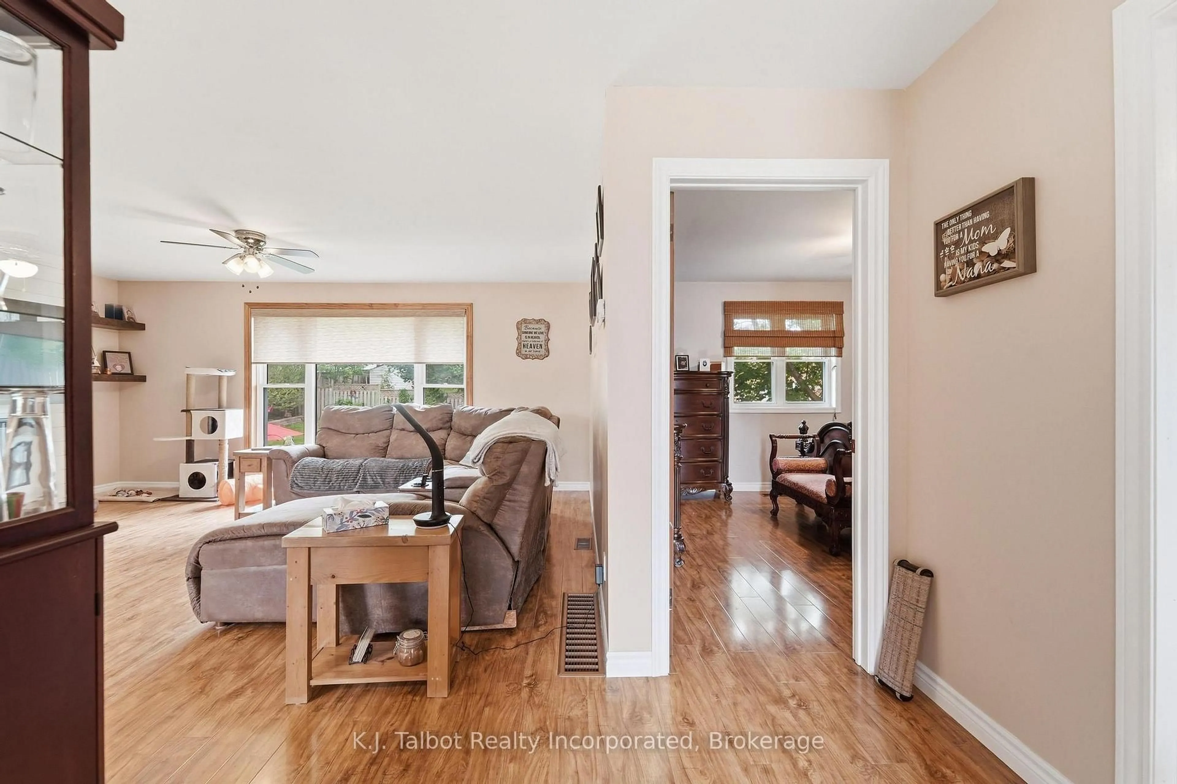Living room with furniture, wood/laminate floor for 155 James St, Central Huron Ontario N0M 1L0