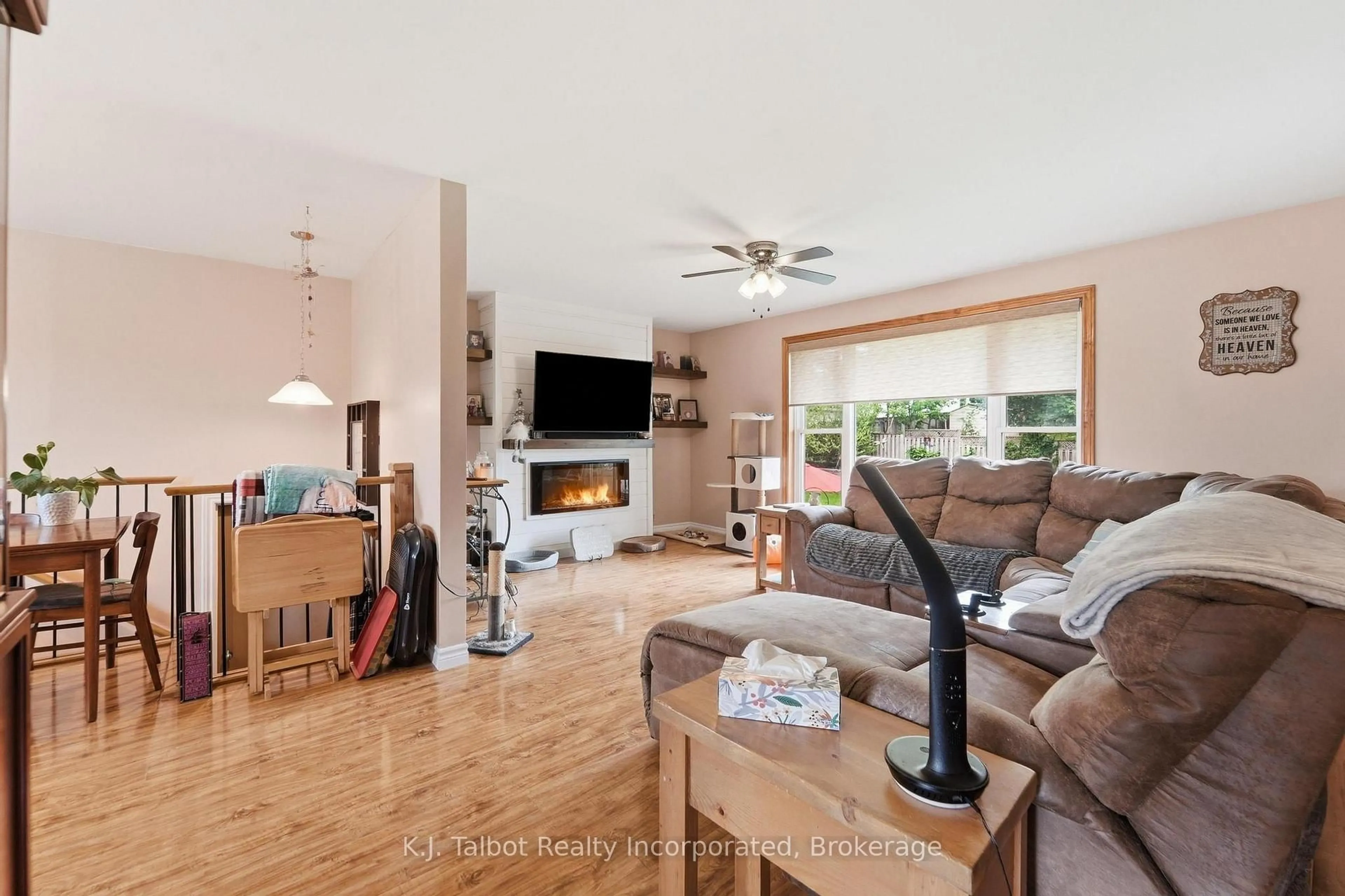 Living room with furniture, wood/laminate floor for 155 James St, Central Huron Ontario N0M 1L0