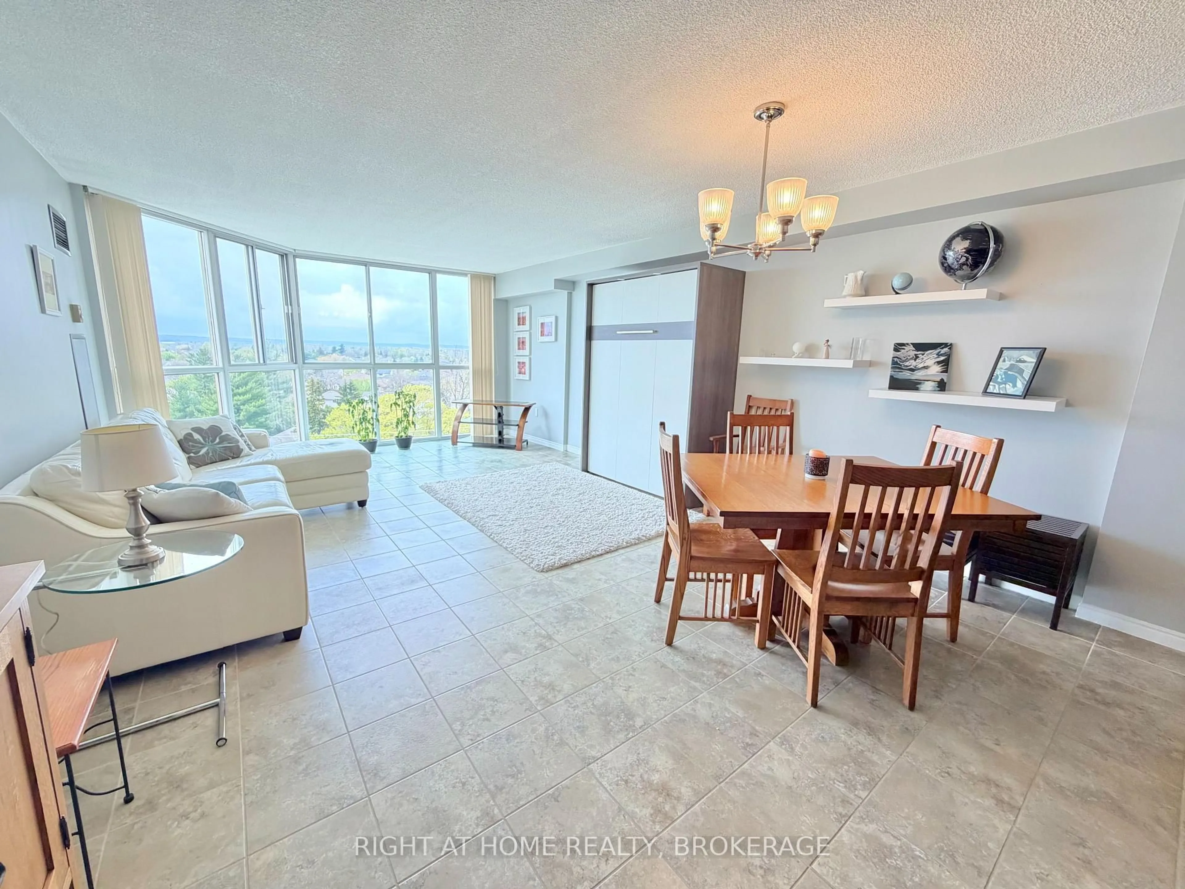 Living room with furniture, unknown for 162 Martindale Rd #801, St. Catharines Ontario L2S 3S4