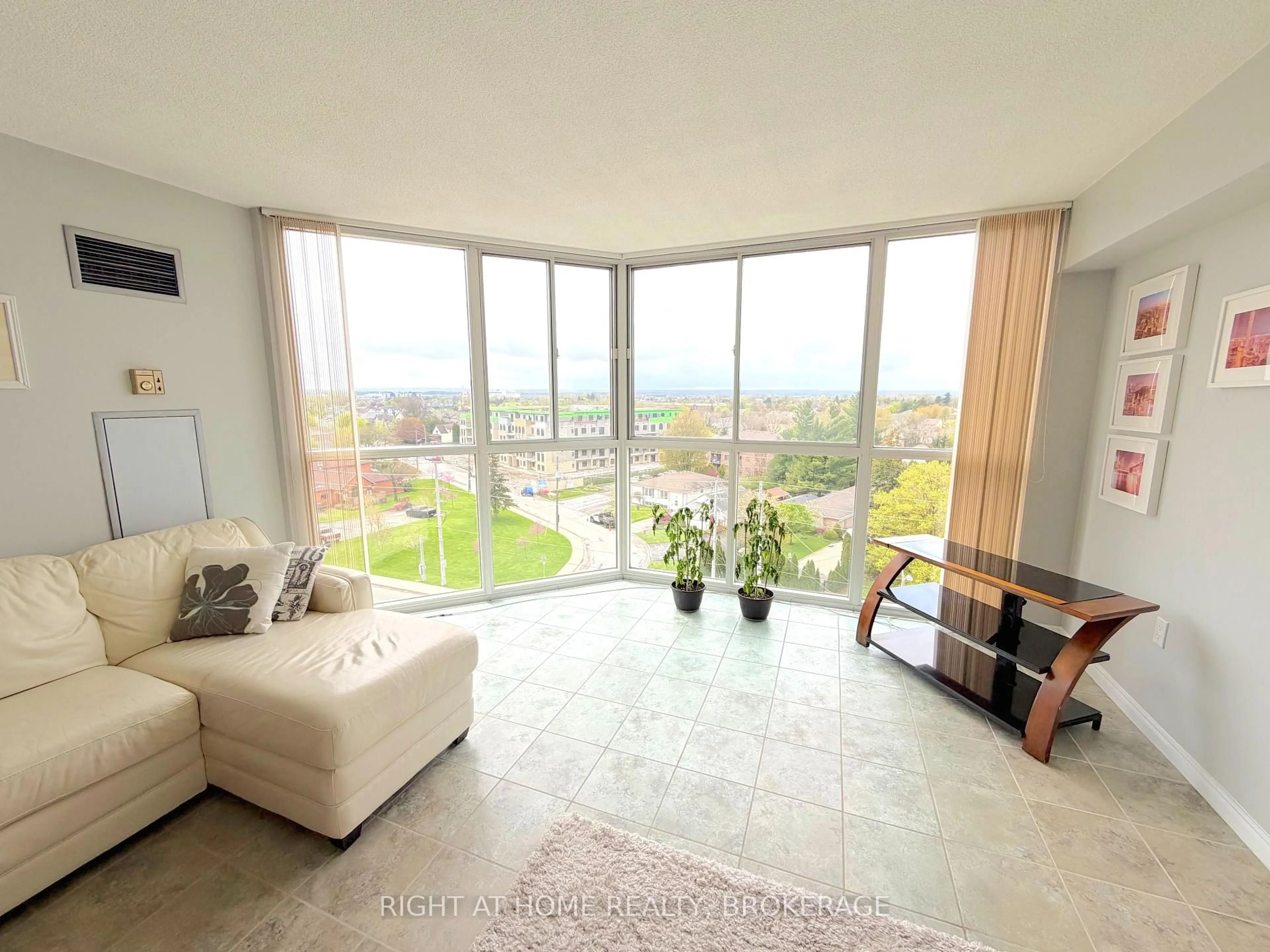 Living room with furniture, unknown for 162 Martindale Rd #801, St. Catharines Ontario L2S 3S4