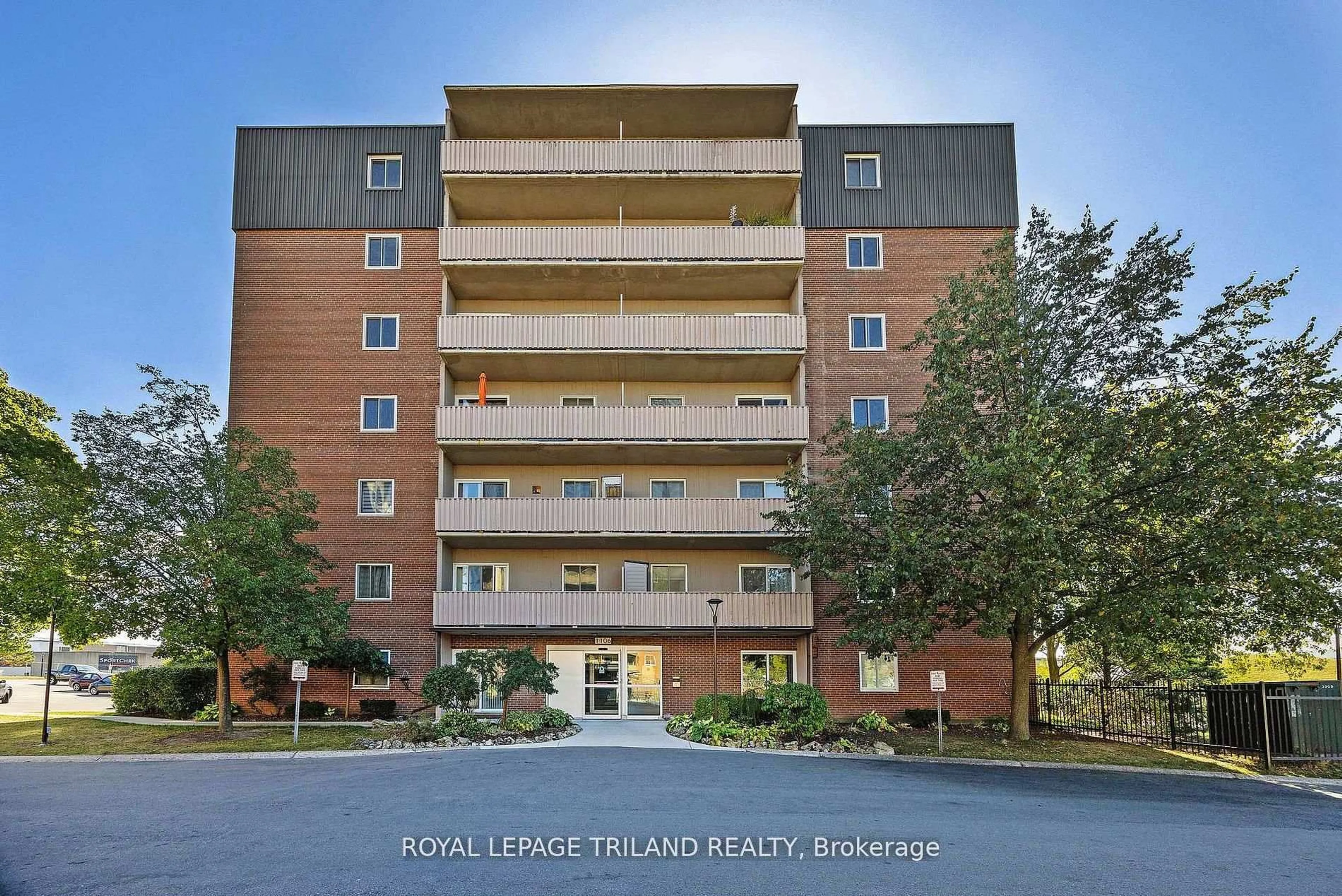A pic from outside/outdoor area/front of a property/back of a property/a pic from drone, unknown for 1106 Jalna Blvd #302, London South Ontario N6E 2R9
