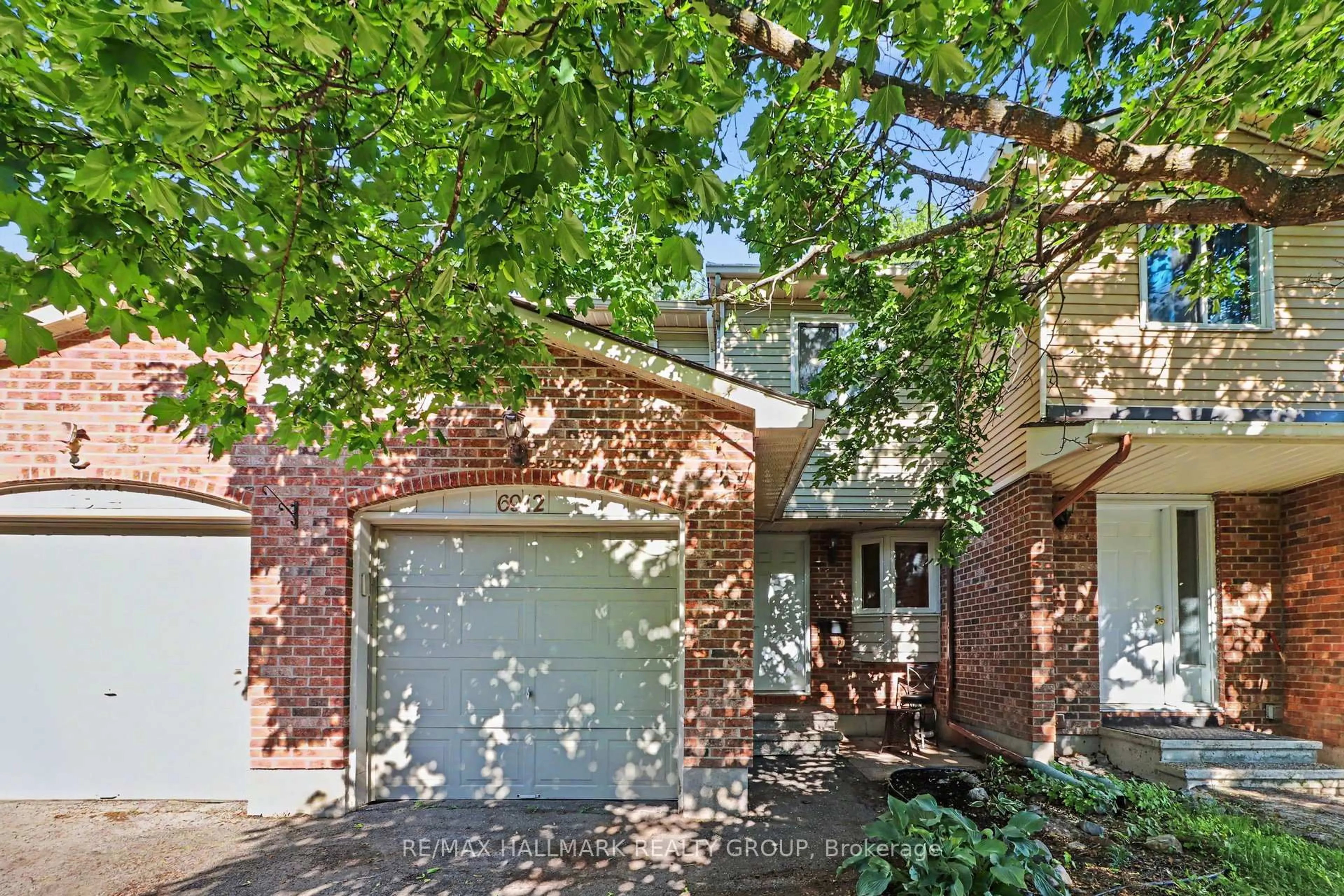 Home with brick exterior material, street for 6912 Du Bois Ave #76, Ottawa Ontario K1C 5L3