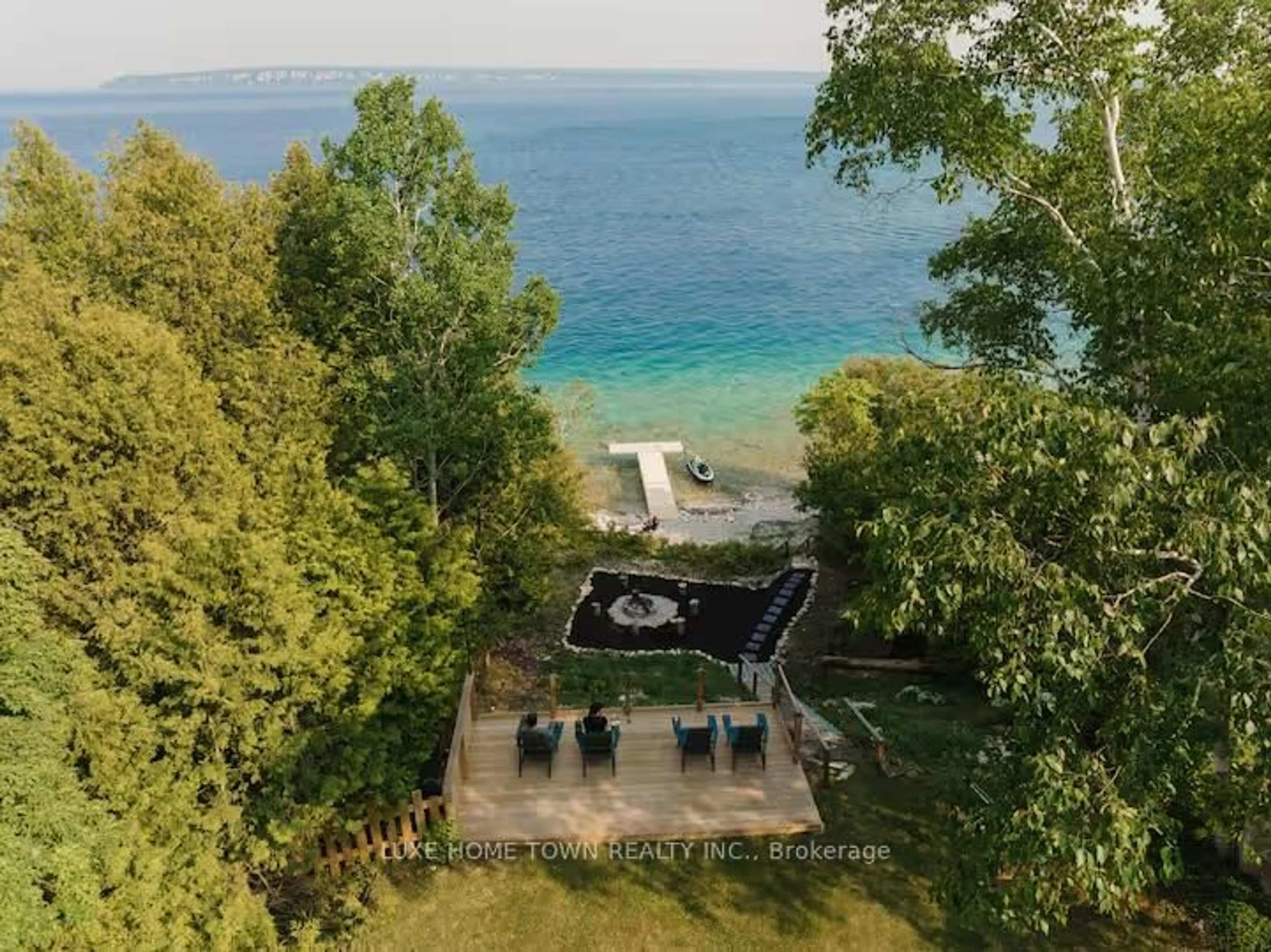 A pic from outside/outdoor area/front of a property/back of a property/a pic from drone, water/lake/river/ocean view for 46 Whippoorwill Rd, Northern Bruce Peninsula Ontario N0H 1W0