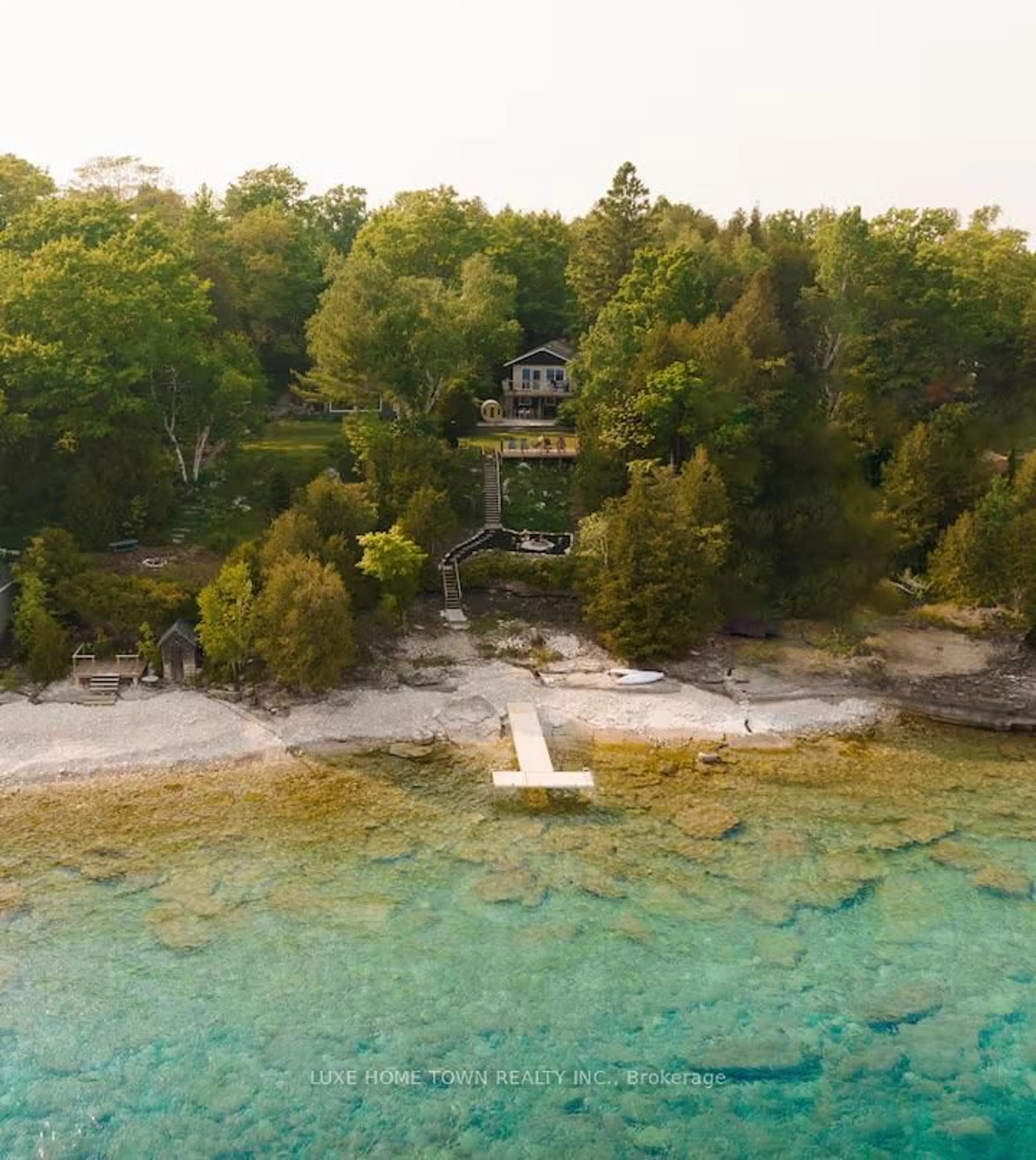 A pic from outside/outdoor area/front of a property/back of a property/a pic from drone, water/lake/river/ocean view for 46 Whippoorwill Rd, Northern Bruce Peninsula Ontario N0H 1W0